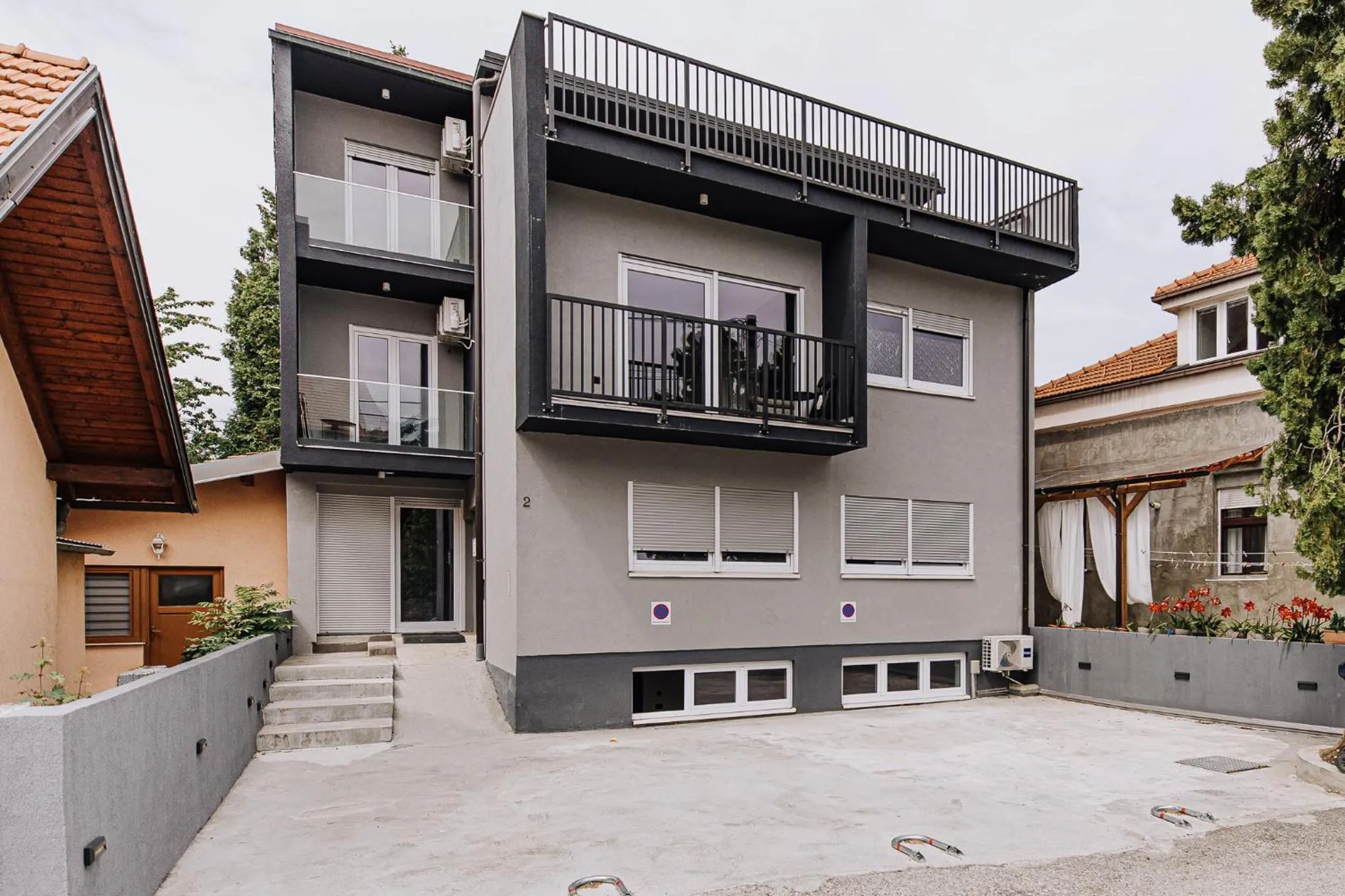 Property building in Allegra Rooms