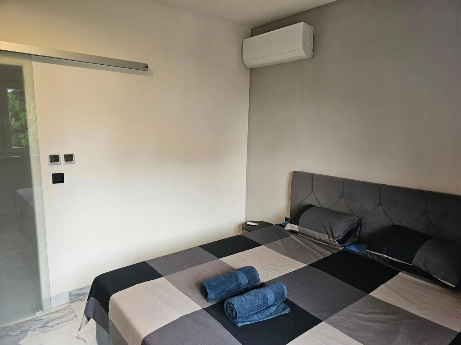 Bed in Allegra Rooms