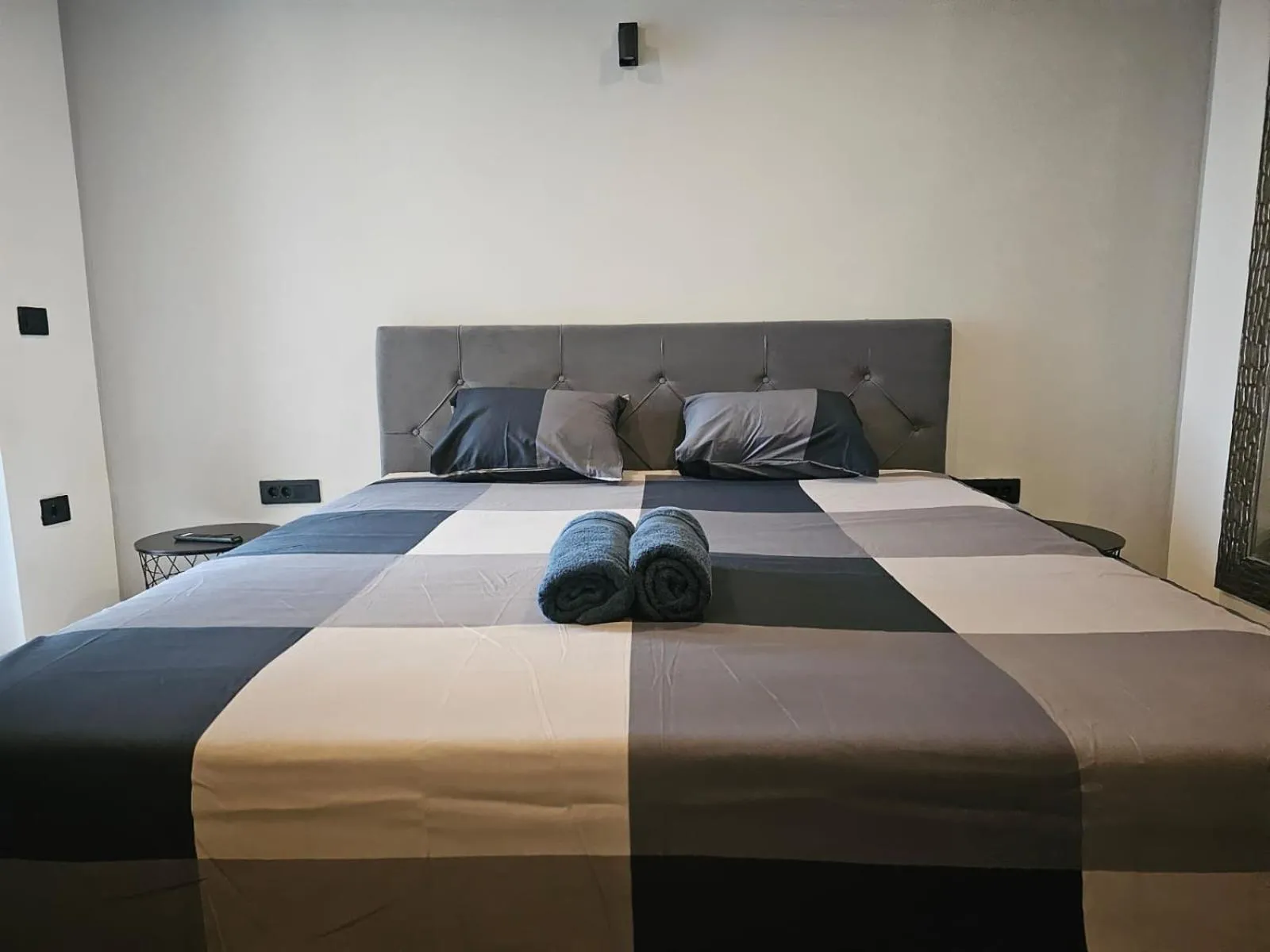 Bed in Allegra Rooms