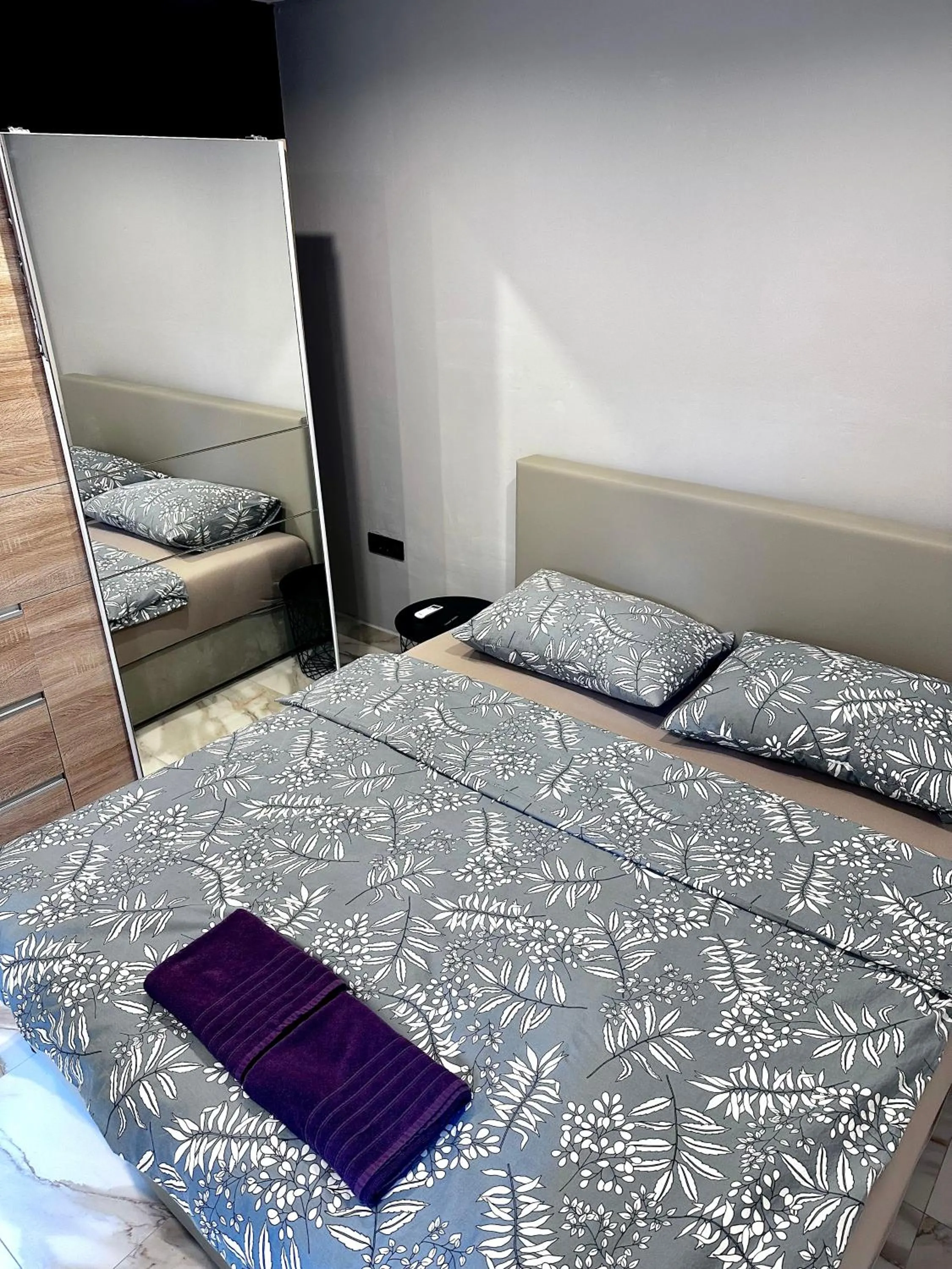 Bed in Allegra Rooms