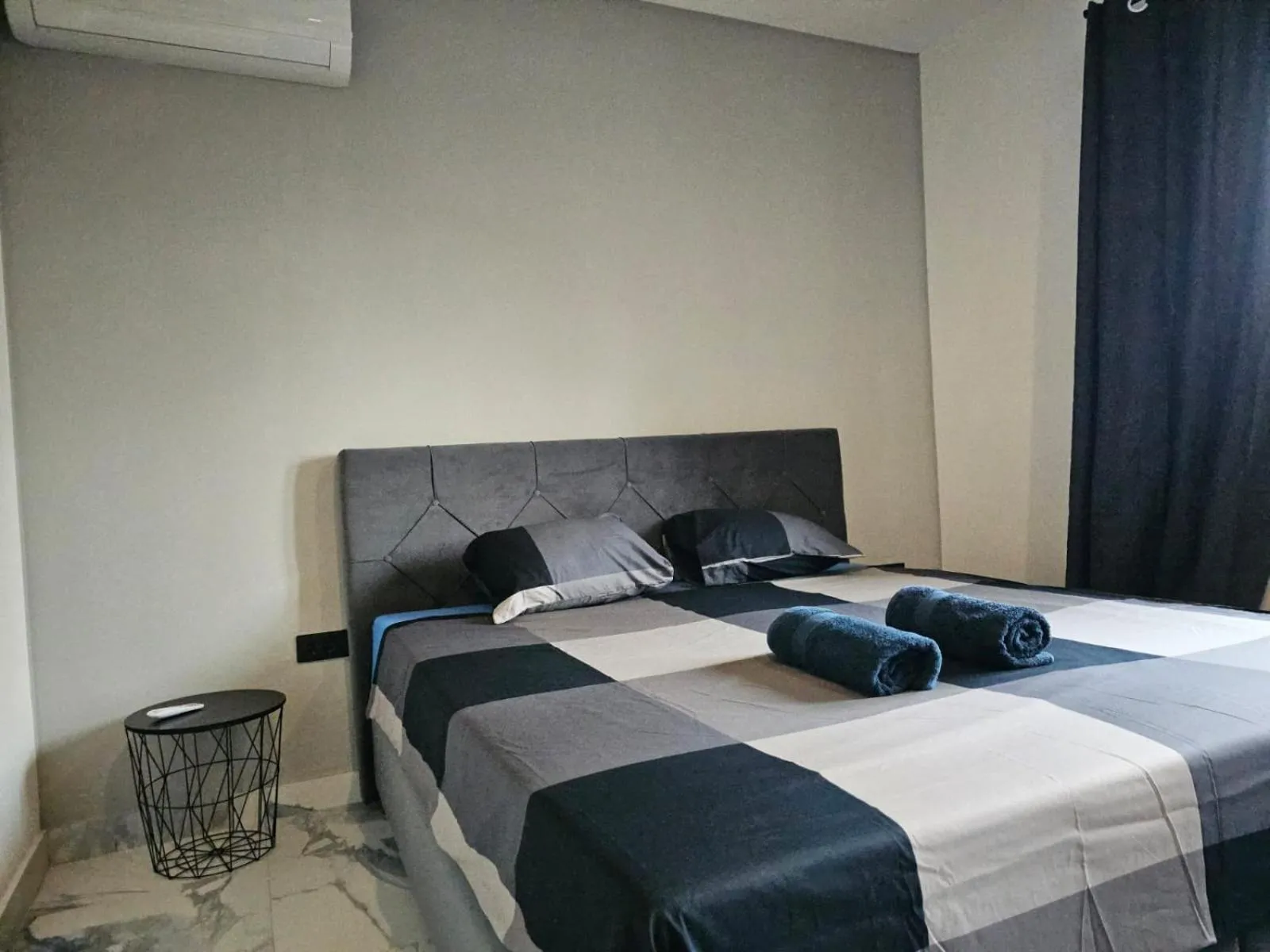 Bed in Allegra Rooms