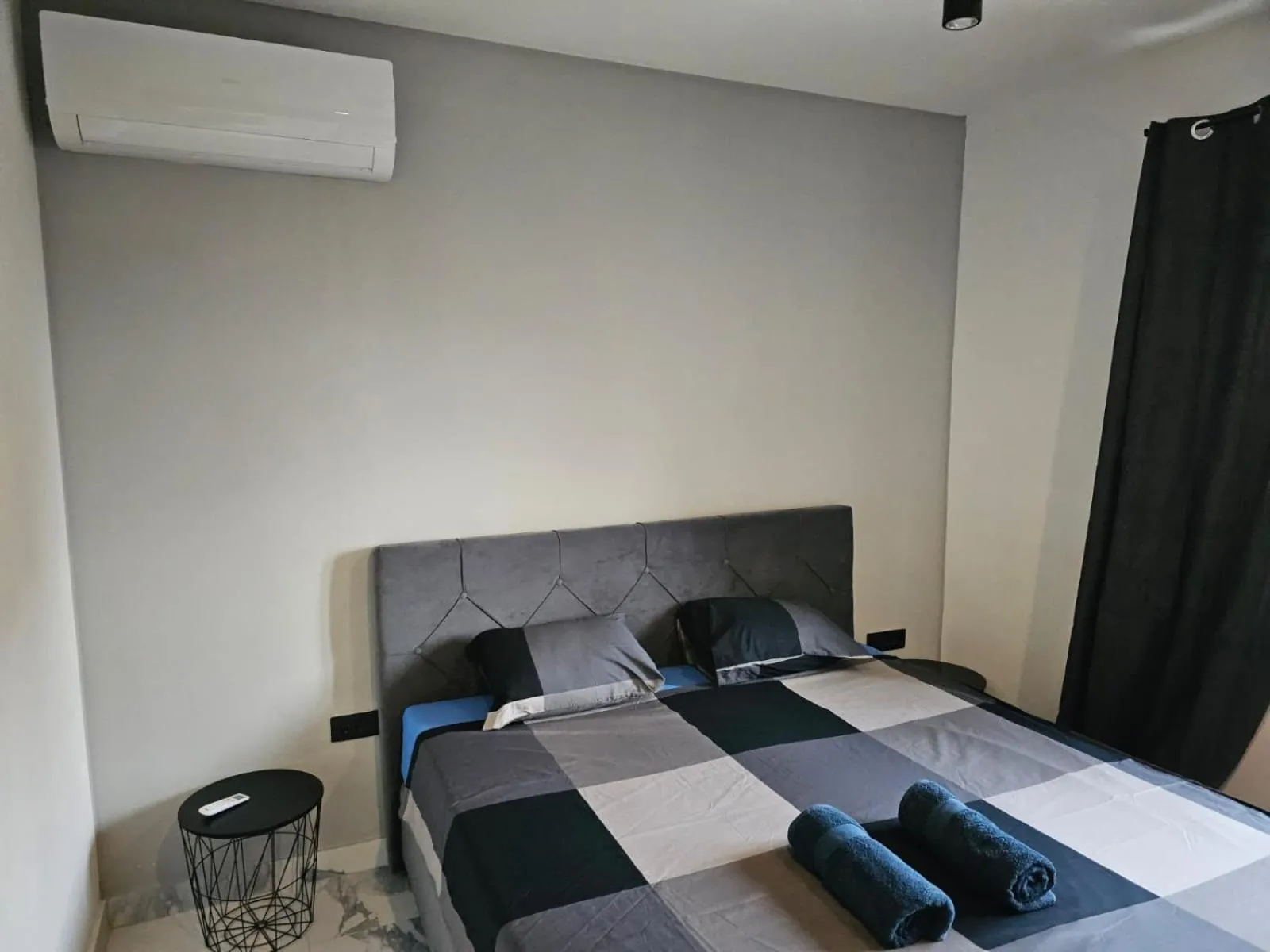 Bed in Allegra Rooms