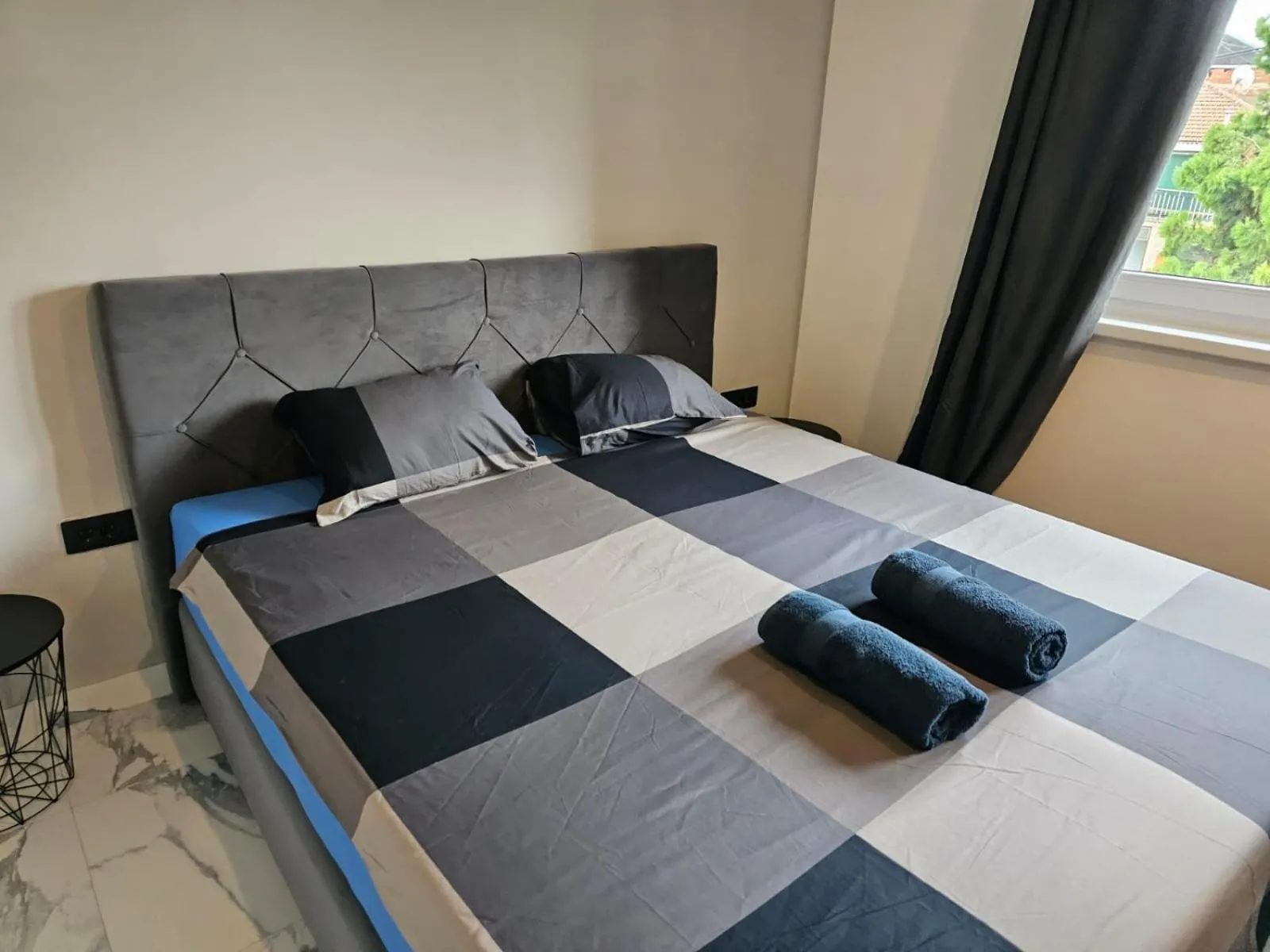 Bed in Allegra Rooms