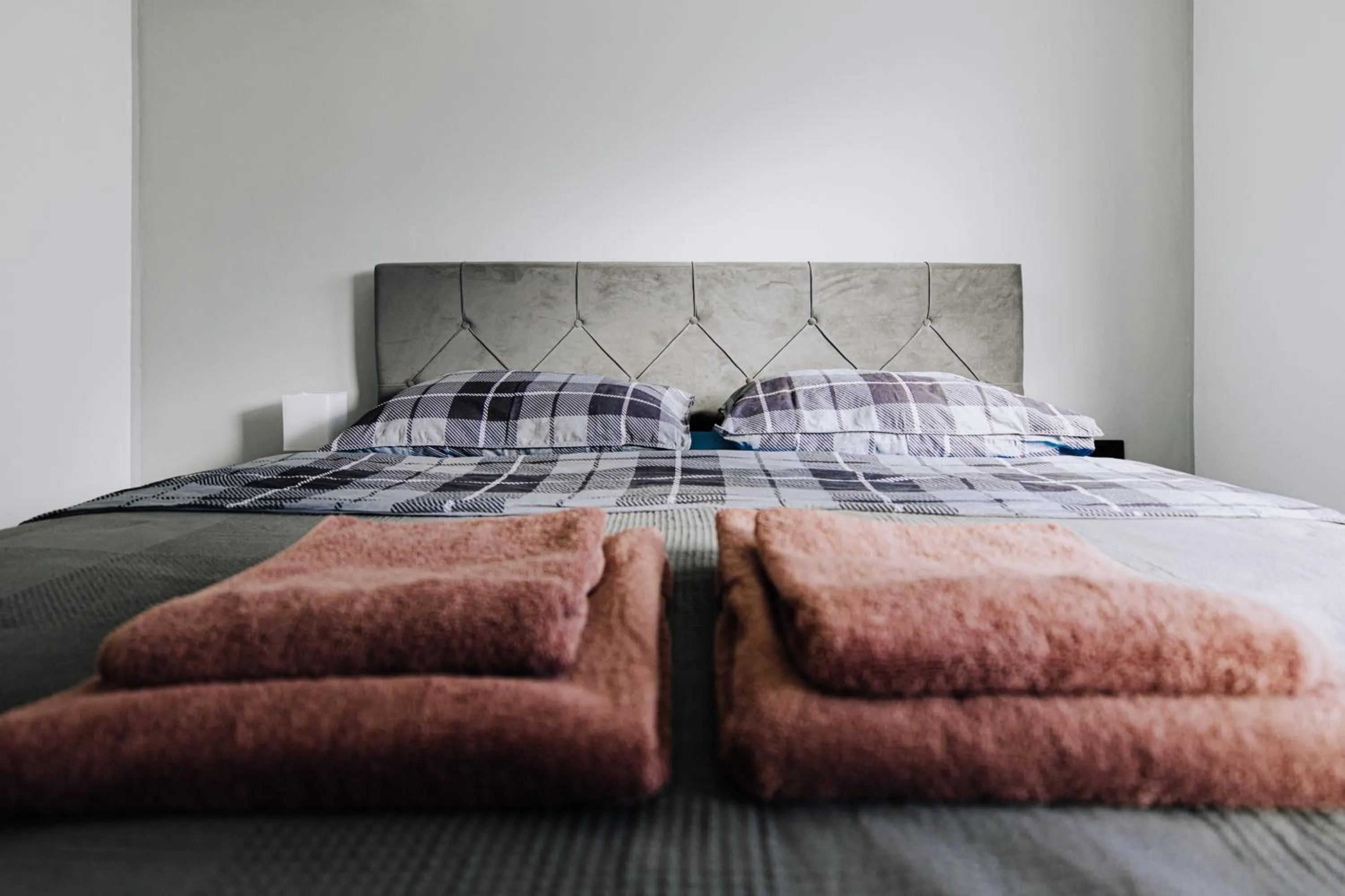 Bed in Allegra Rooms