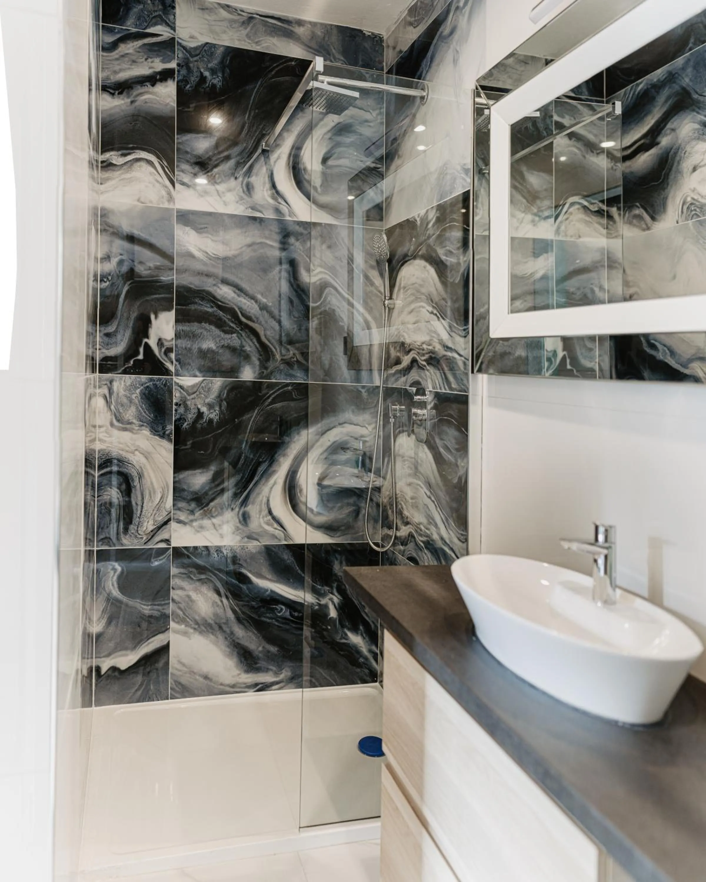 Shower in Allegra Rooms