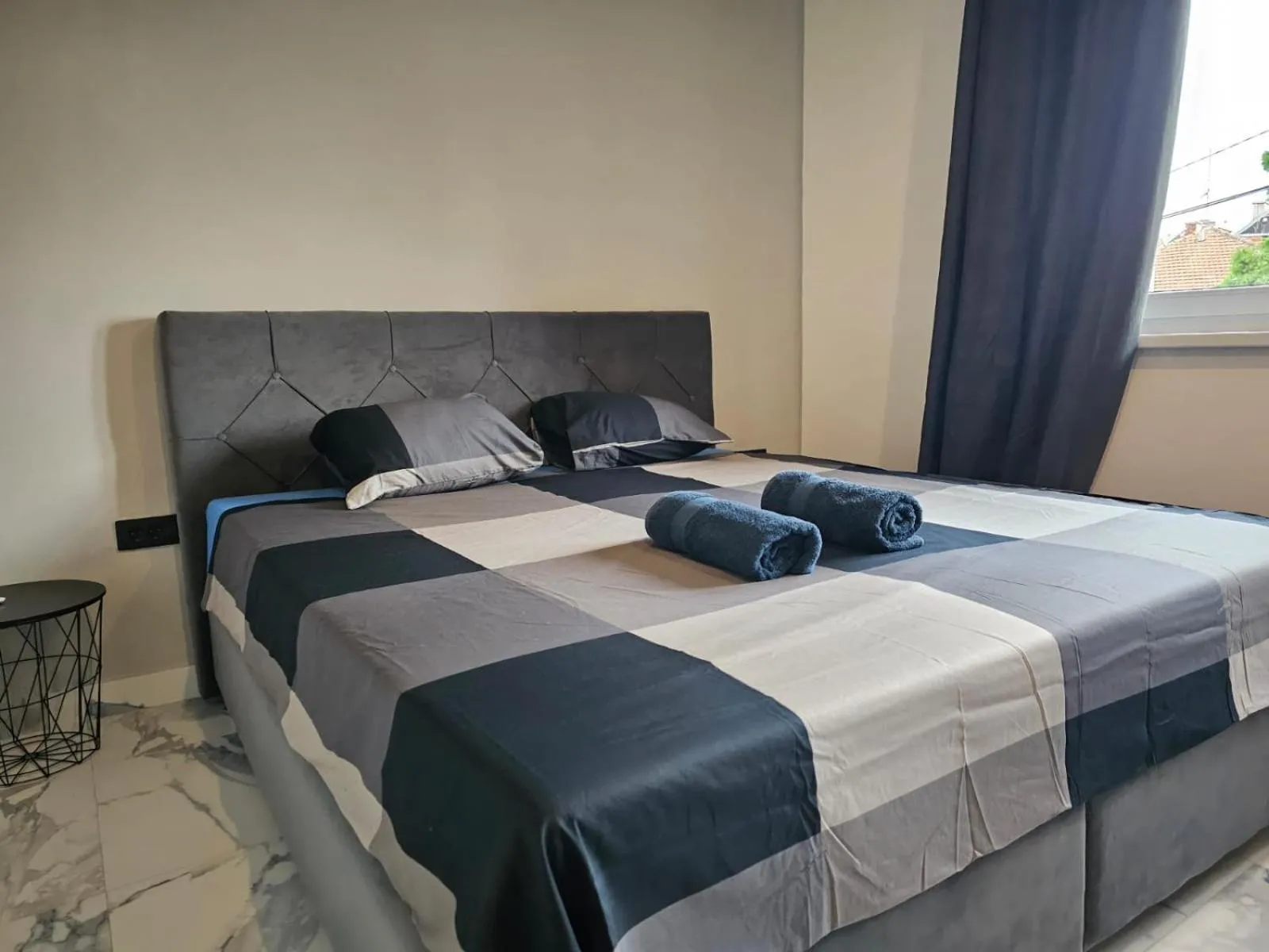Bed in Allegra Rooms