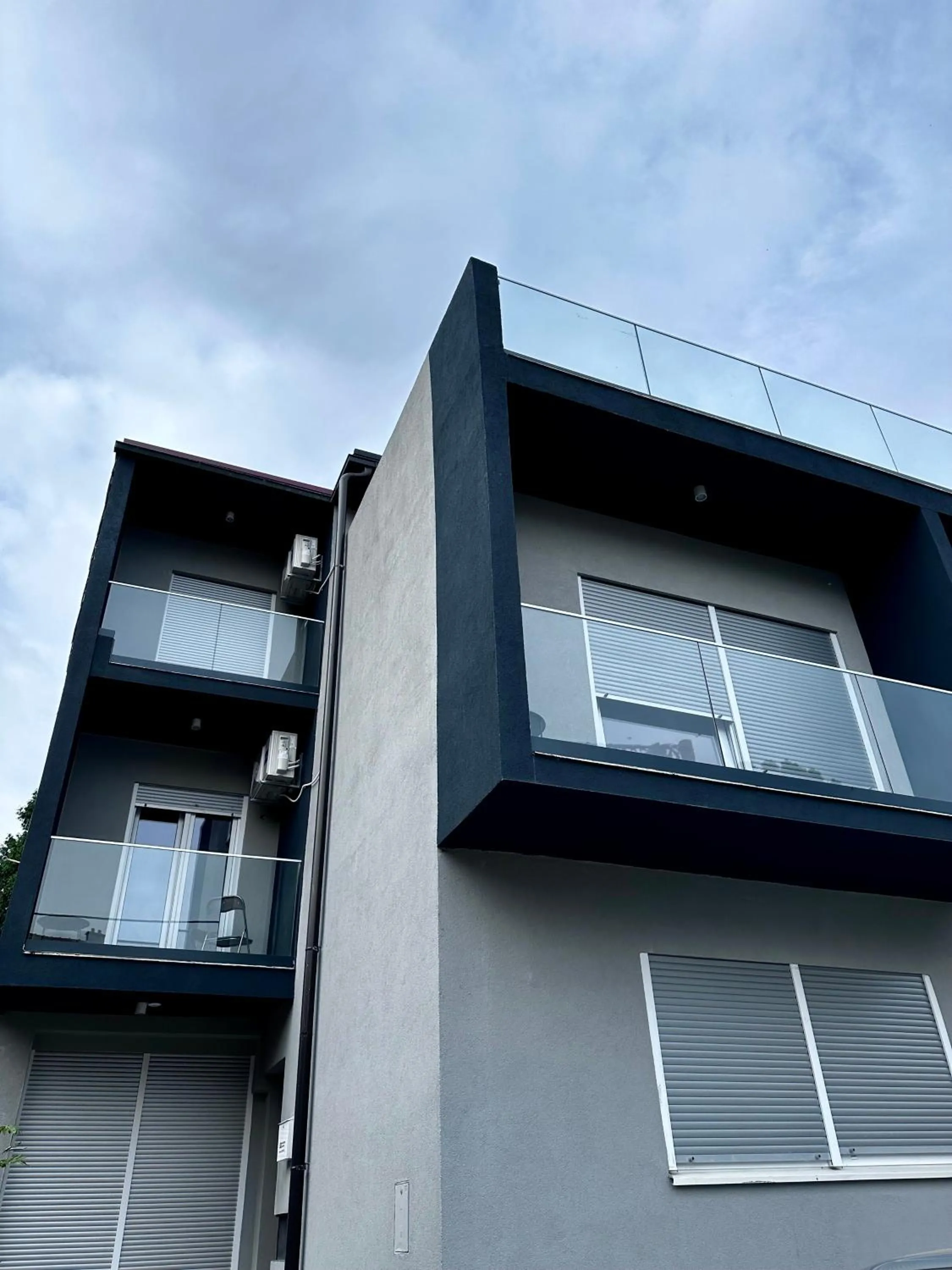 Property building in Allegra Rooms