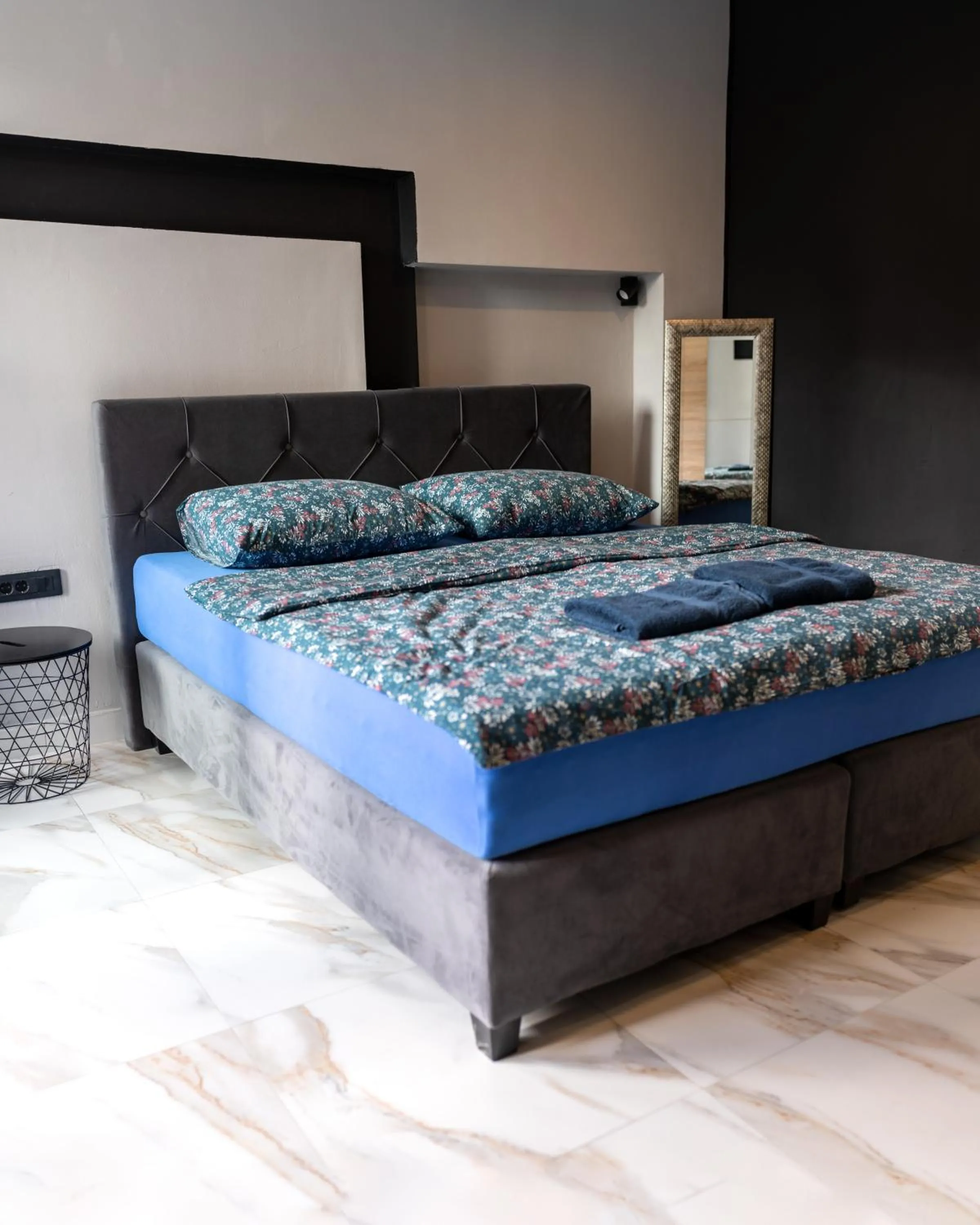 Bed in Allegra Rooms
