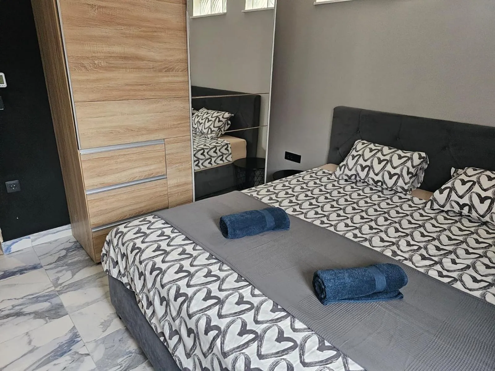 Bed in Allegra Rooms