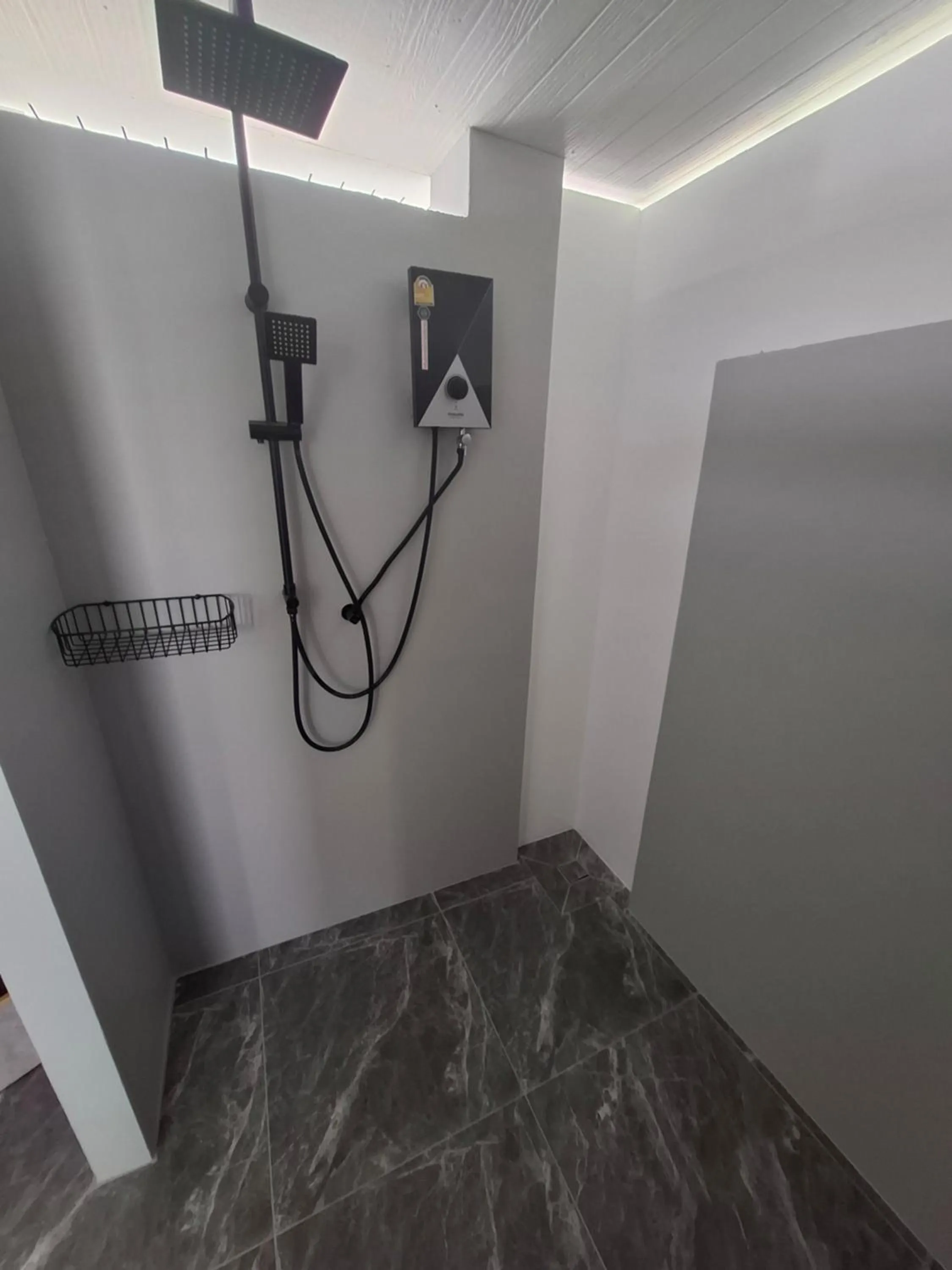 Shower in Thiptara Resort - adults only