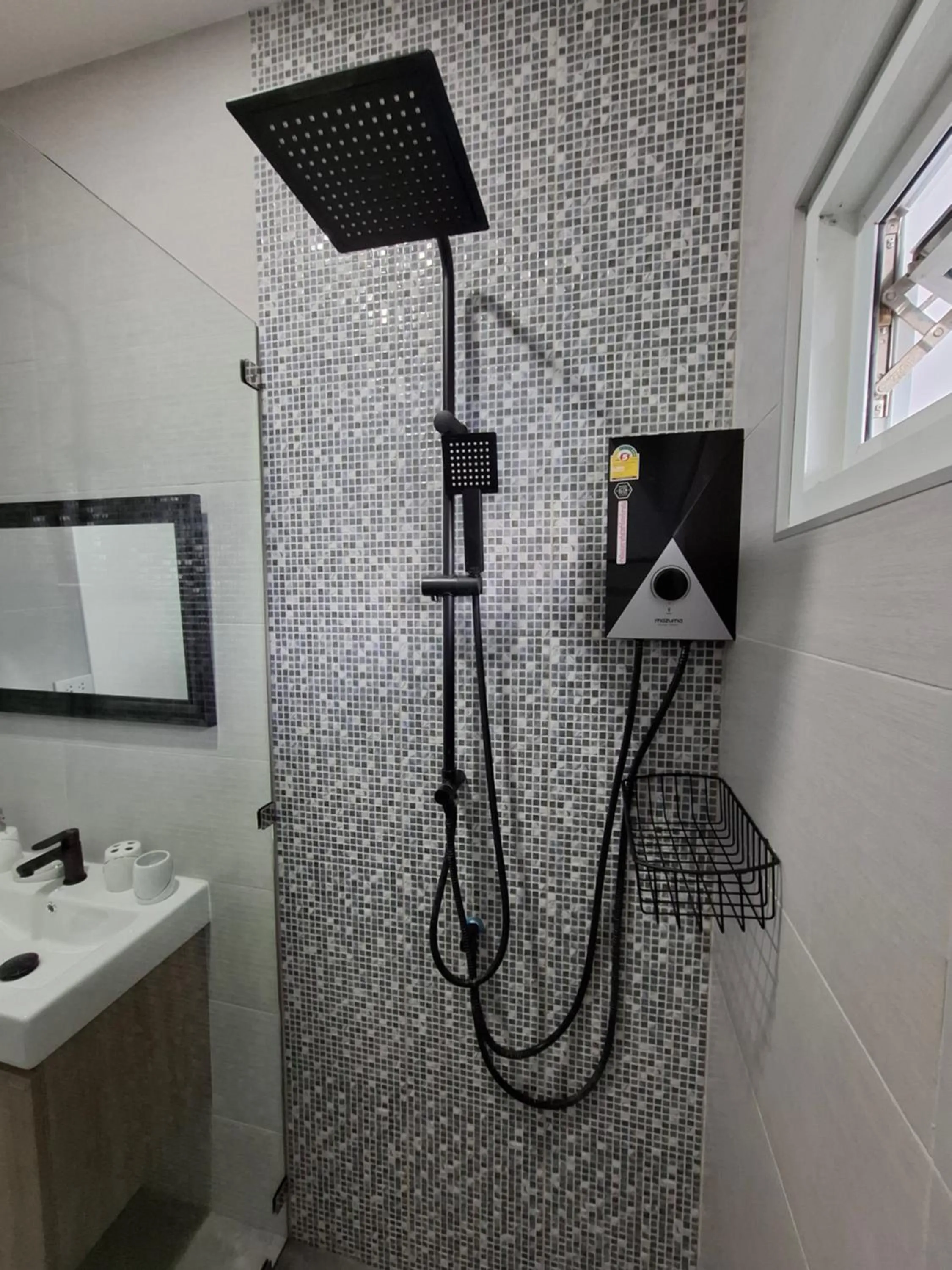 Shower in Thiptara Resort - adults only