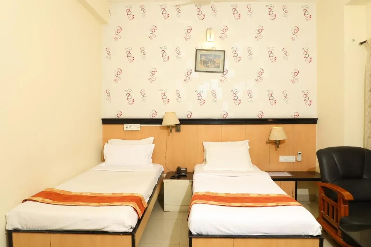 Bed in Hotel Shrie Shaanth