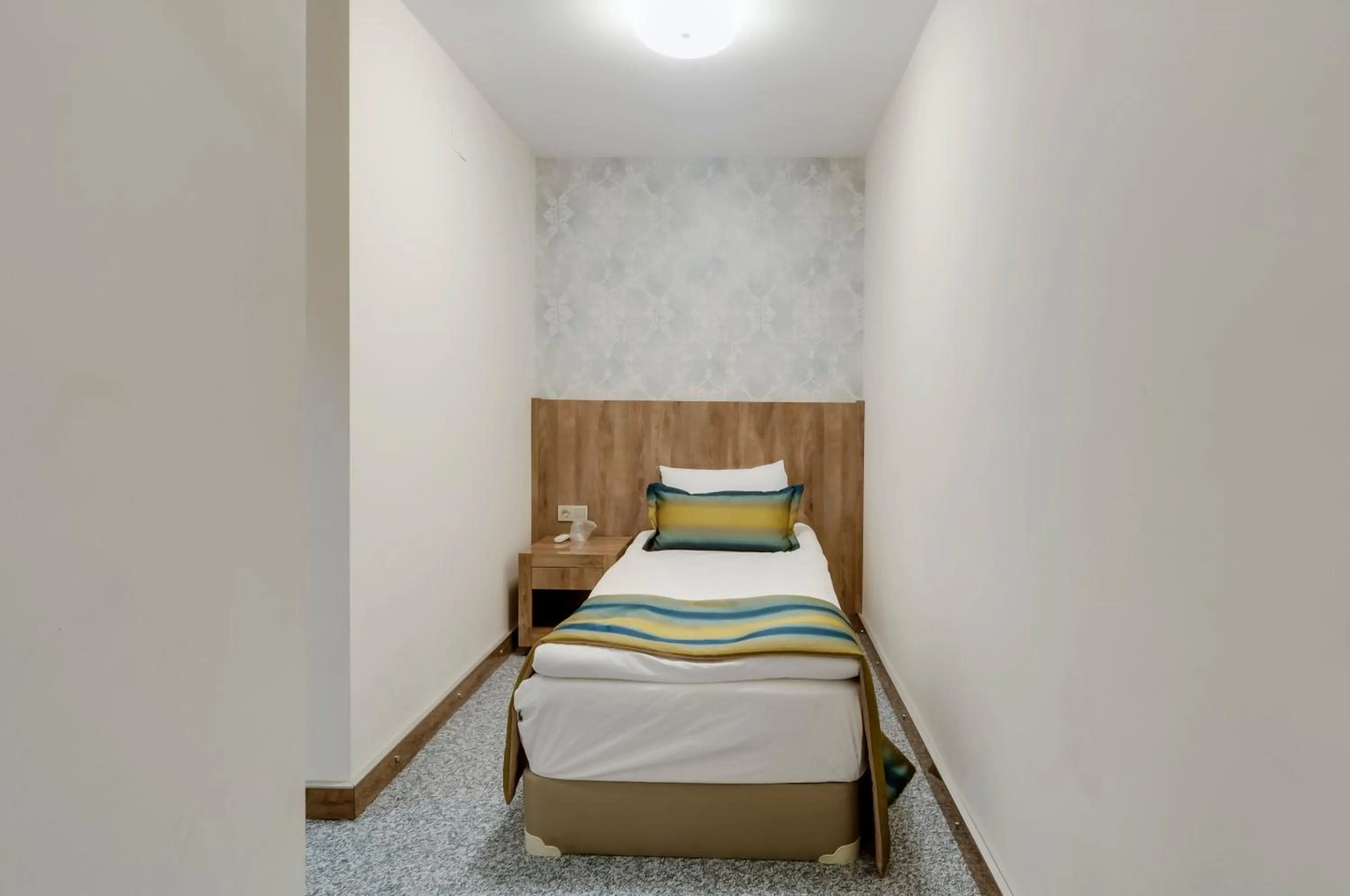 Bed in PARK YALÇIN HOTEL