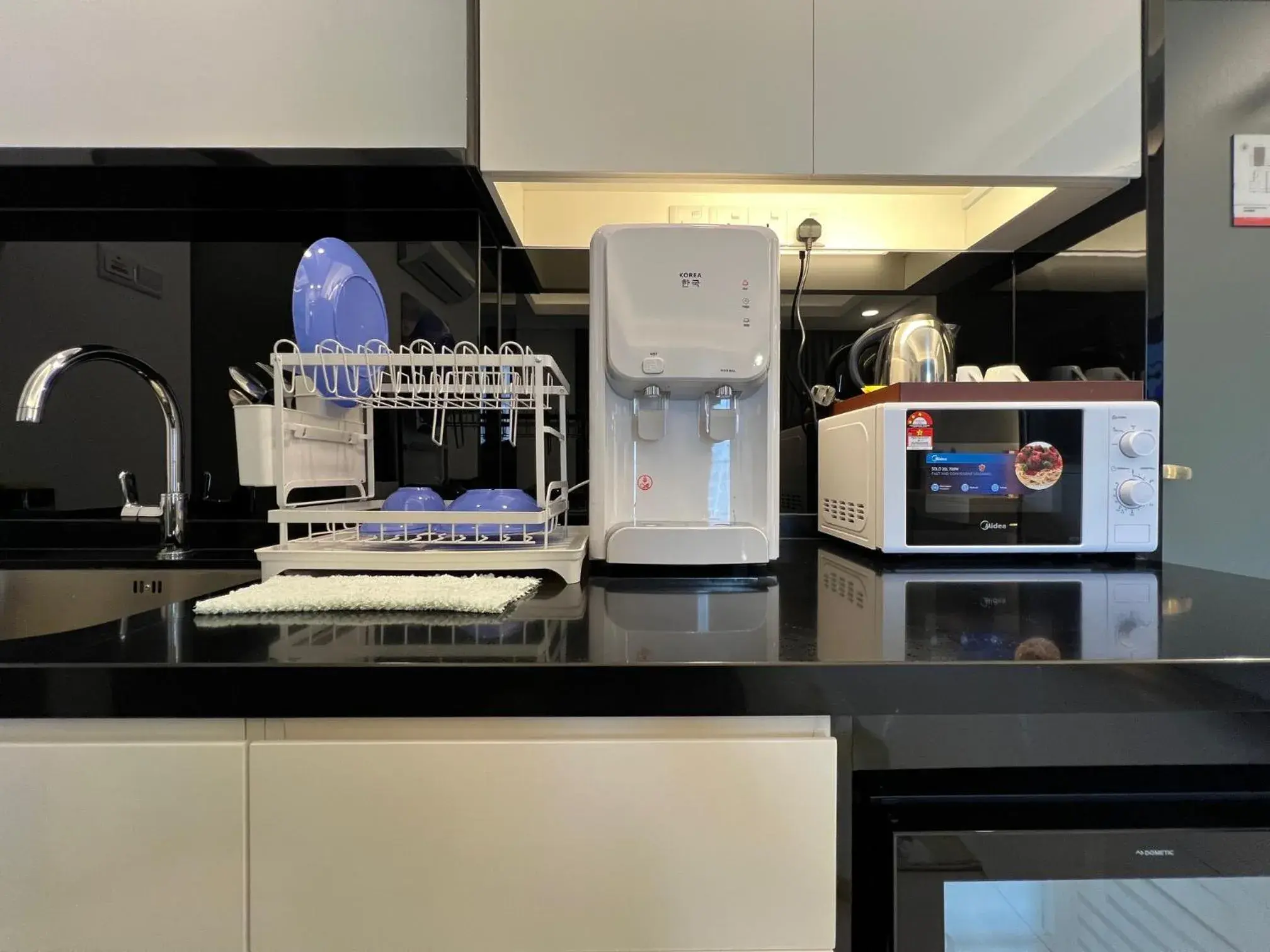 Kitchen or kitchenette in QUINCE HOME GRAND ION DELEMEN GENTING HIGHLANDs Kitchen or kitchenette in QUINCE HOME GRAND ION DELEMEN GENTING HIGHLANDs