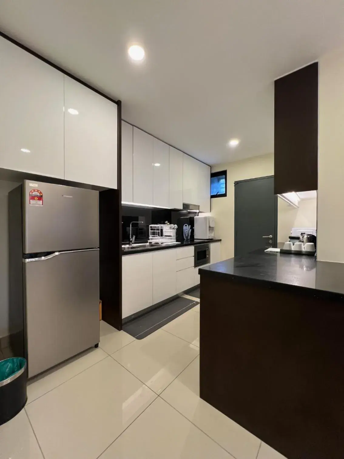 Kitchen or kitchenette in QUINCE HOME GRAND ION DELEMEN GENTING HIGHLANDs Kitchen or kitchenette in QUINCE HOME GRAND ION DELEMEN GENTING HIGHLANDs