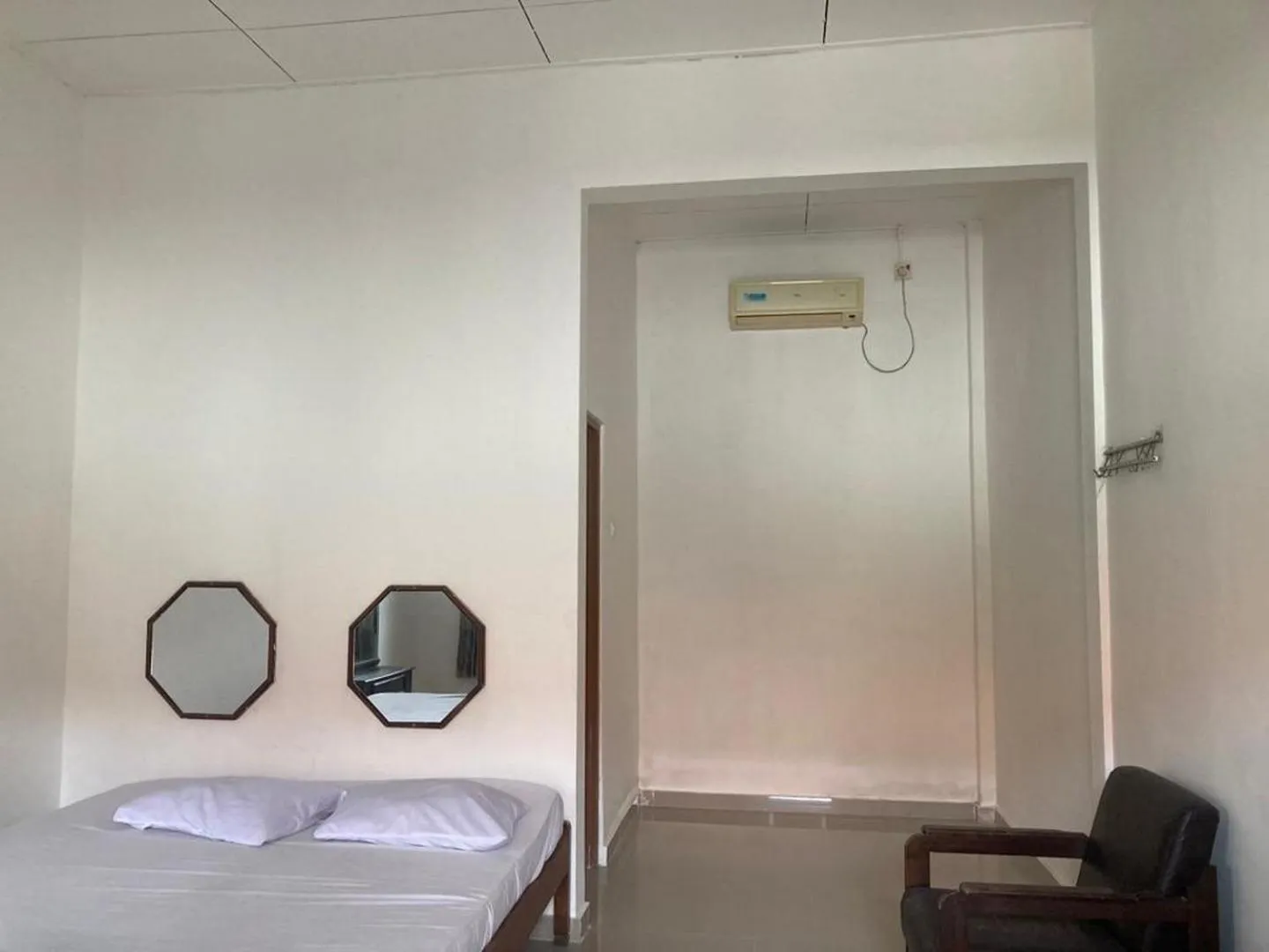 Bedroom, Bed in Hotel Surya Citra Jogja A Mitra RedDoorz