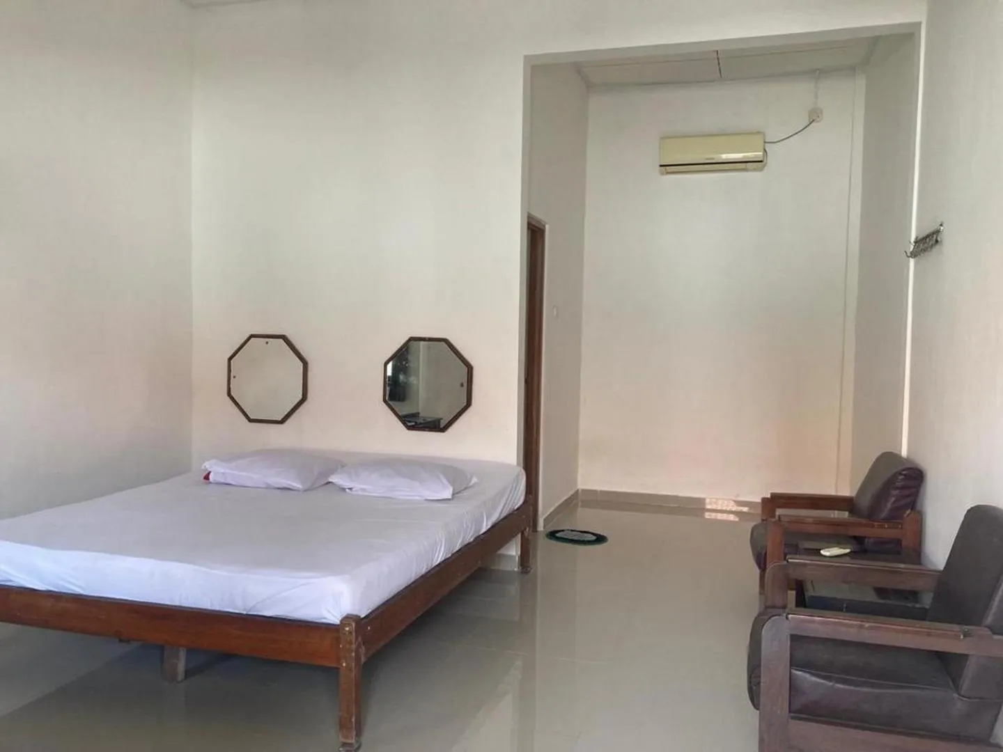 Bedroom, Bed in Hotel Surya Citra Jogja A Mitra RedDoorz