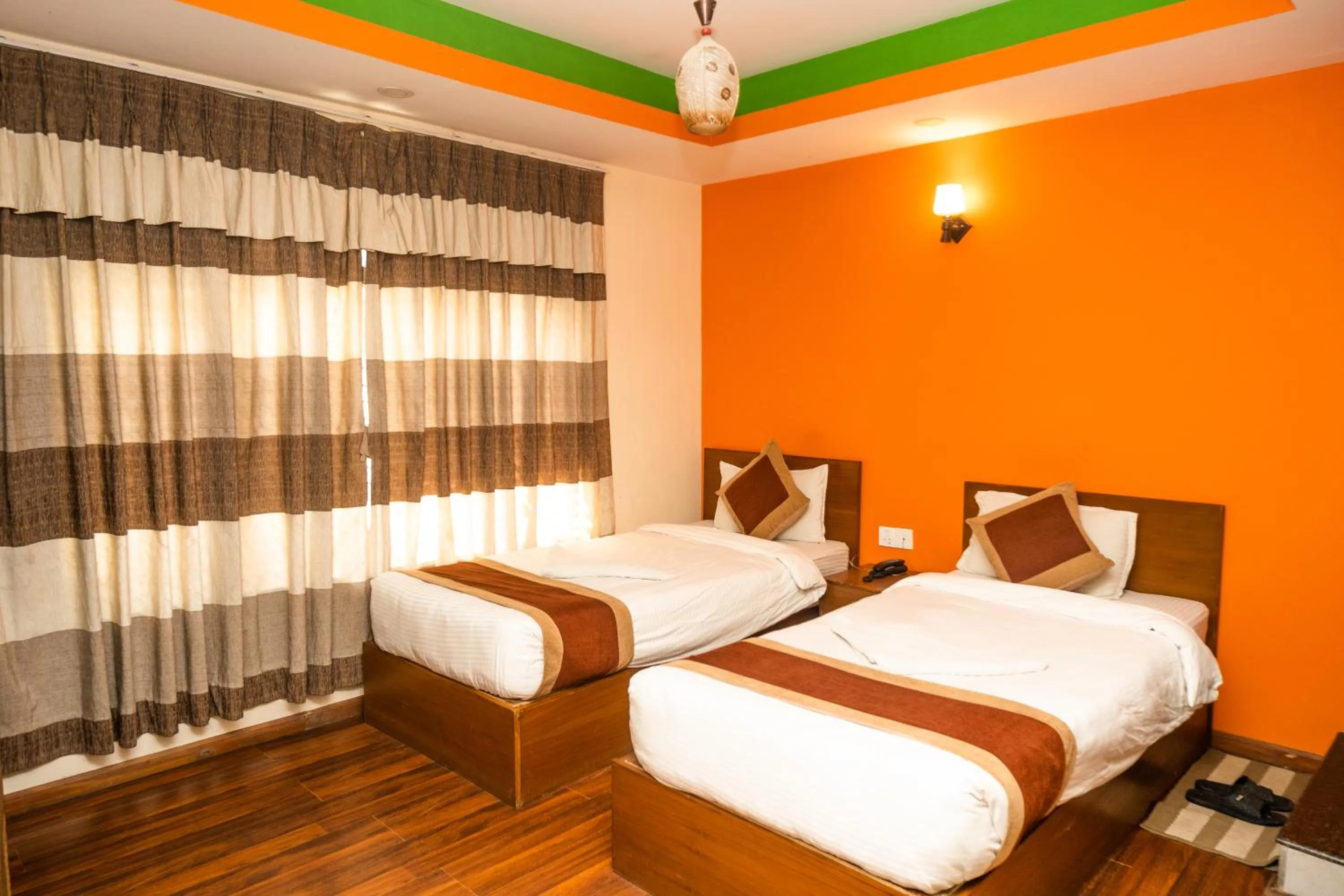 Photo of the whole room, Bed in Kathmandu Peace Hotel