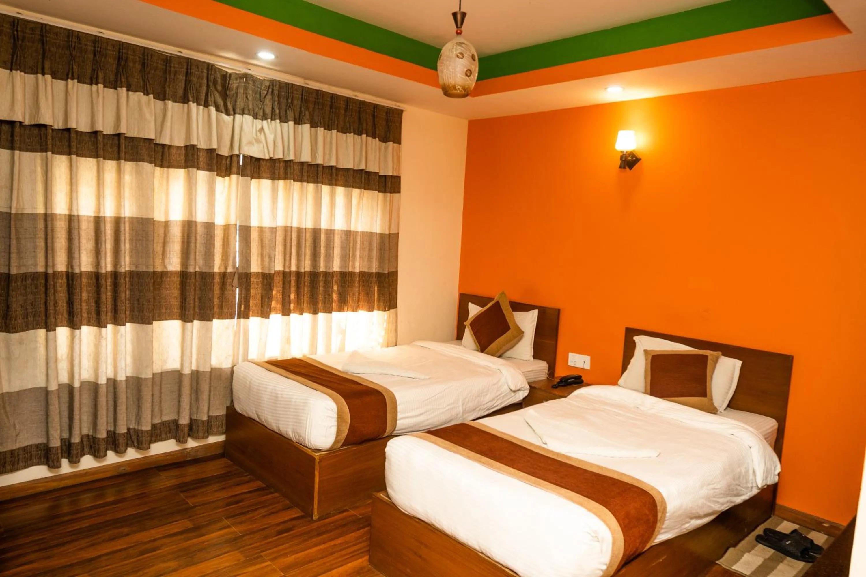 Photo of the whole room, Bed in Kathmandu Peace Hotel