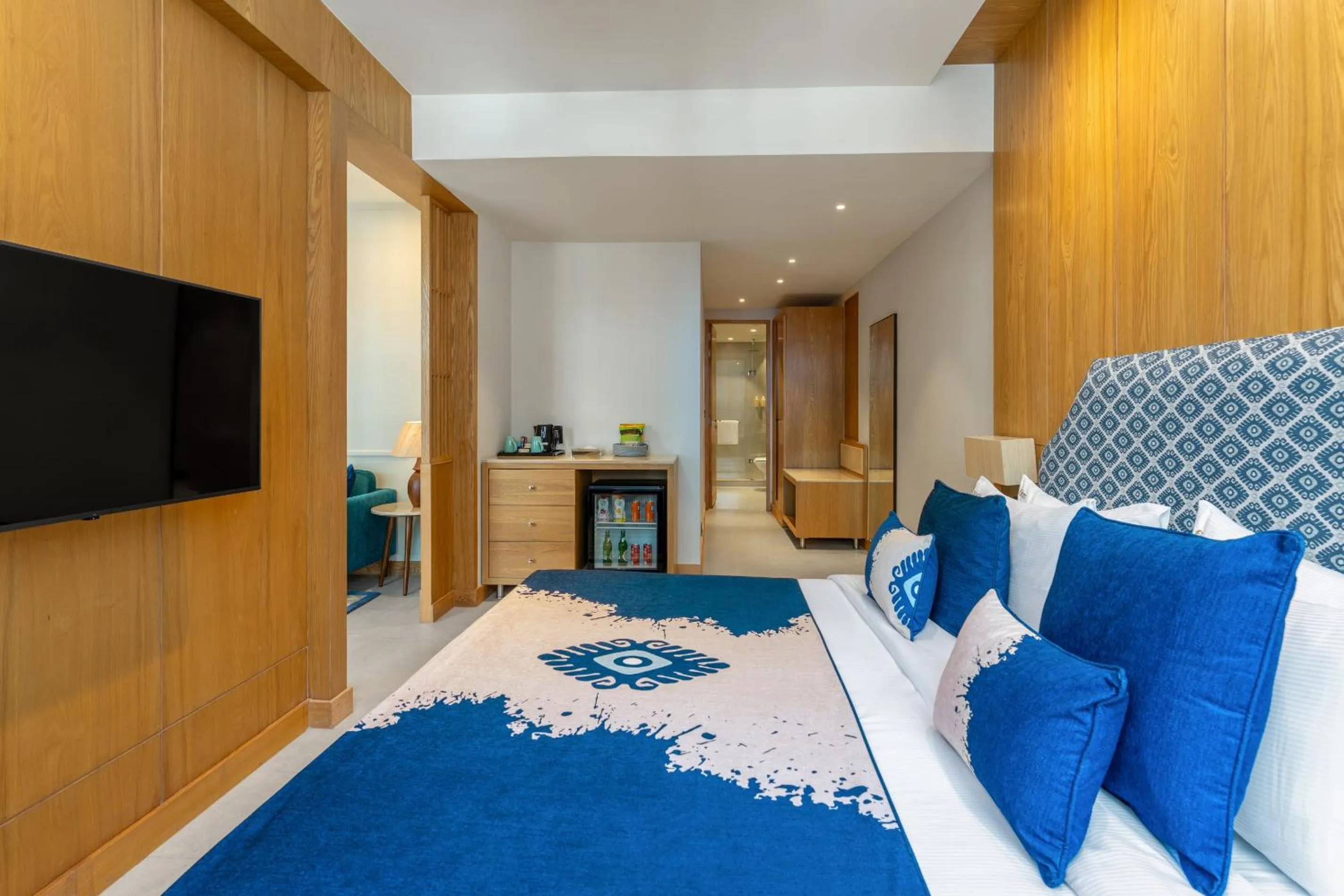 Bed in The Astor - All Suites Hotel Candolim Goa