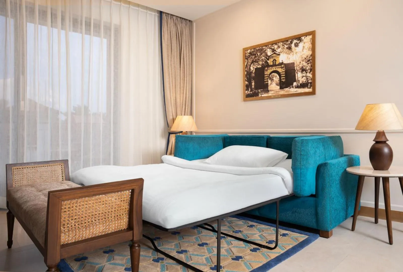 Bed in The Astor - All Suites Hotel Candolim Goa