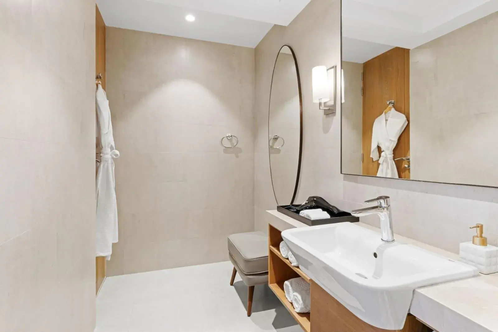 Bathroom in The Astor - All Suites Hotel Candolim Goa Bathroom in The Astor - All Suites Hotel Candolim Goa