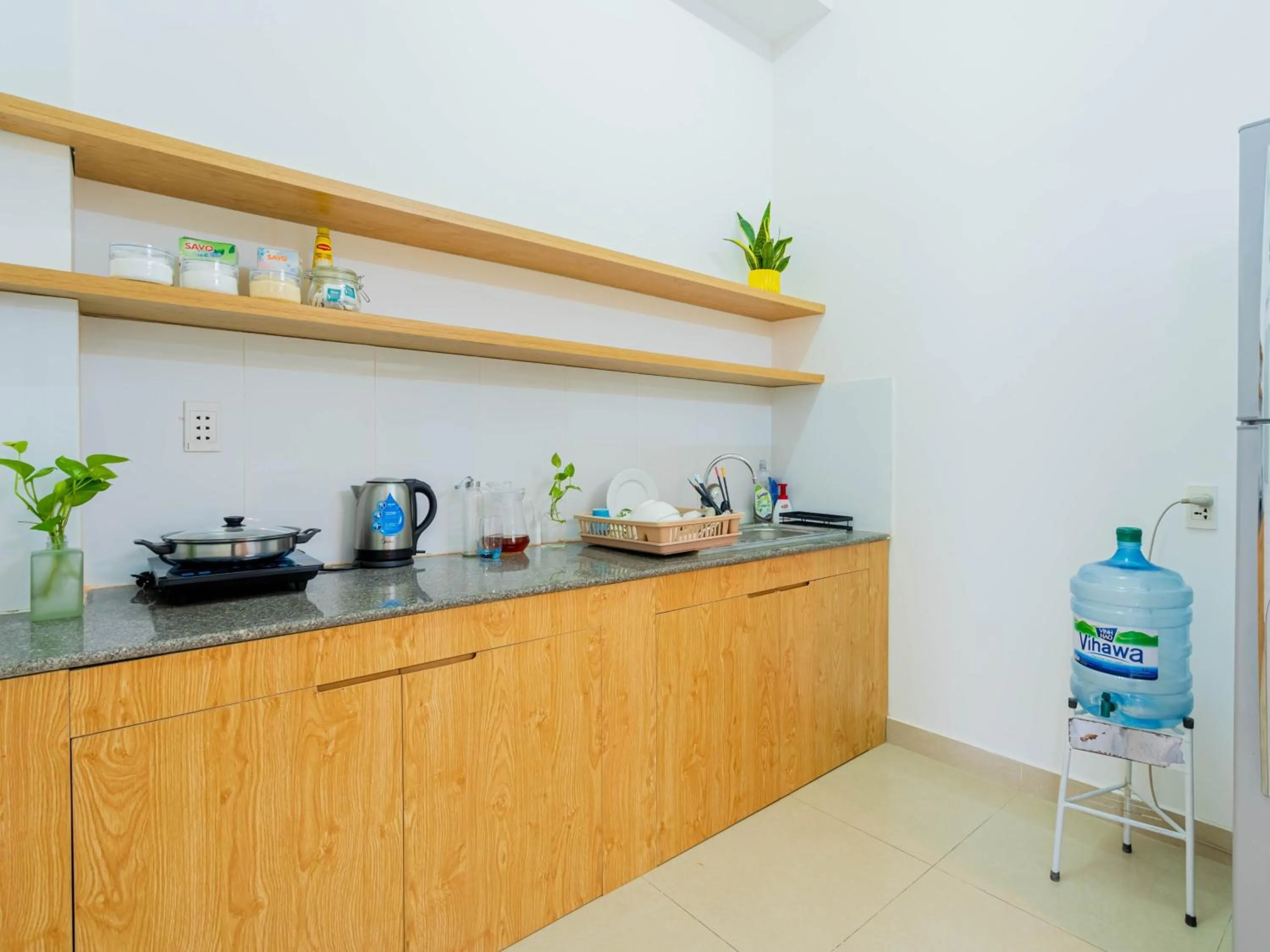 Kitchen or kitchenette in LalaHouse Riverside Residence