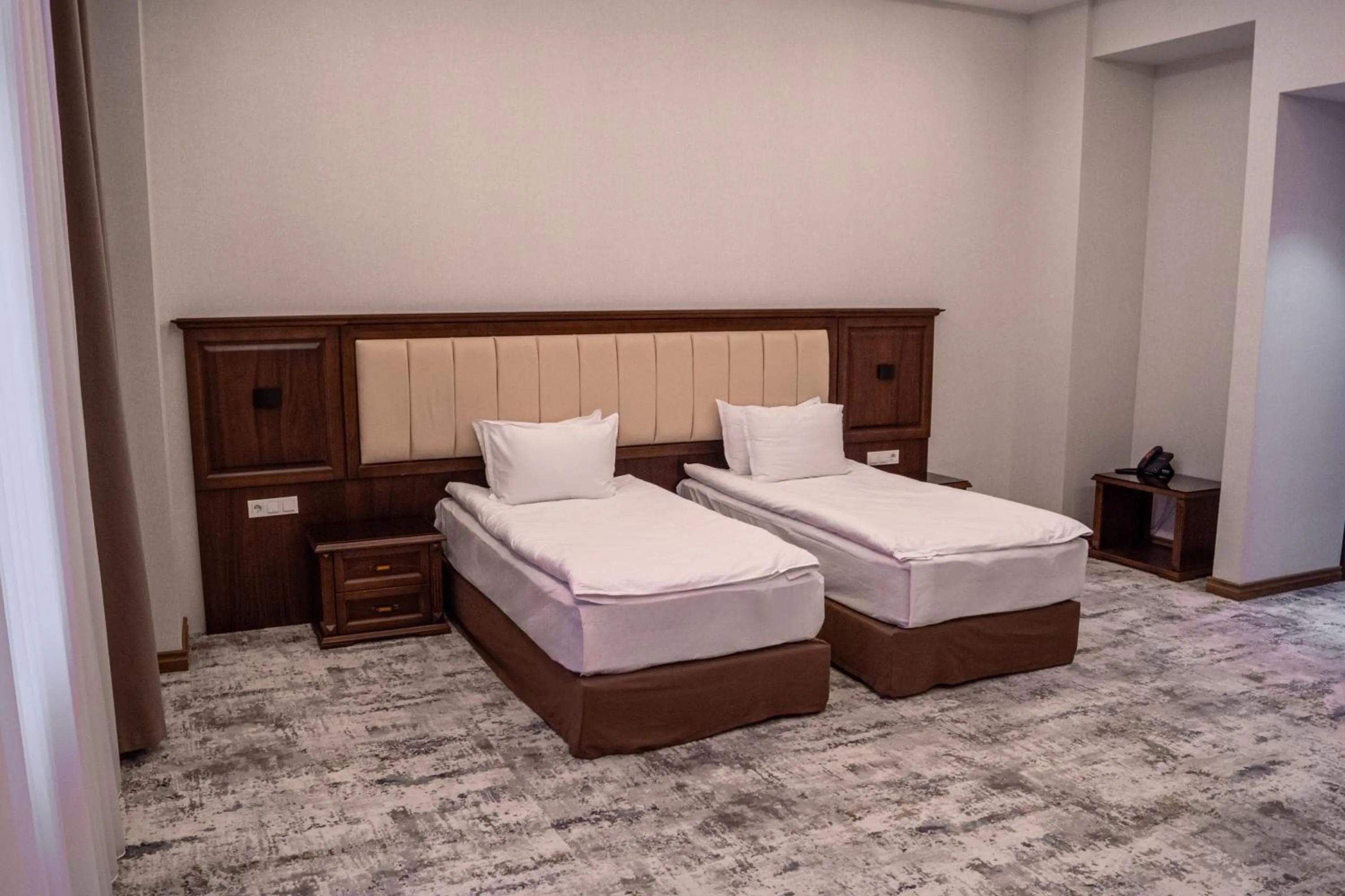 Bed in Grand Plaza Hotel Samarkand