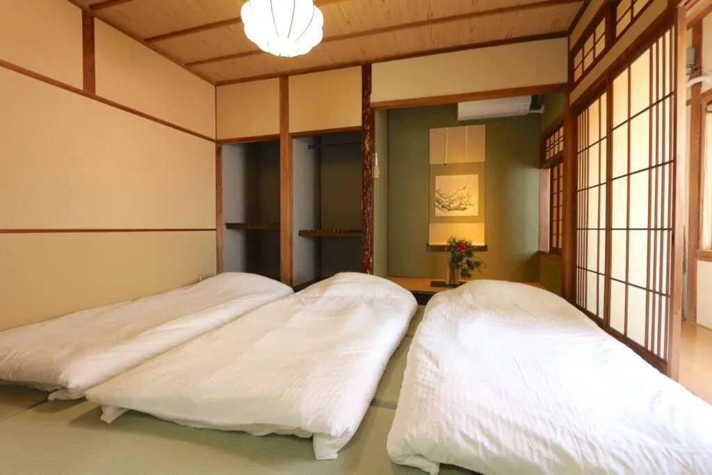 Bed in GUEST HOUSE EN