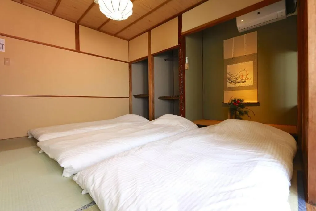Bed in GUEST HOUSE EN