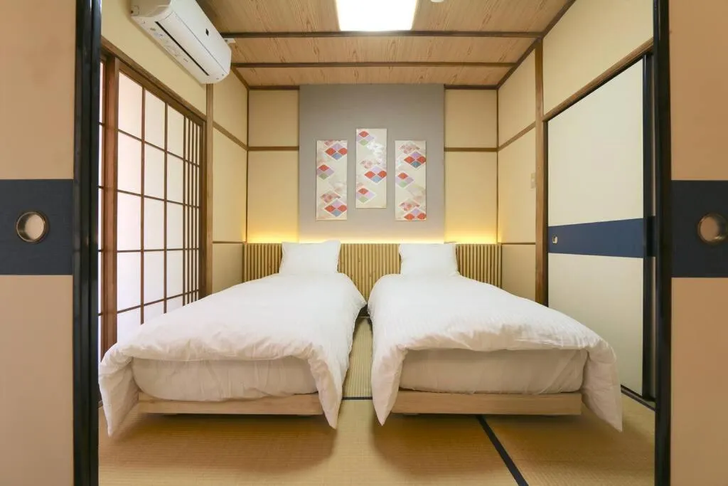Bed in GUEST HOUSE EN