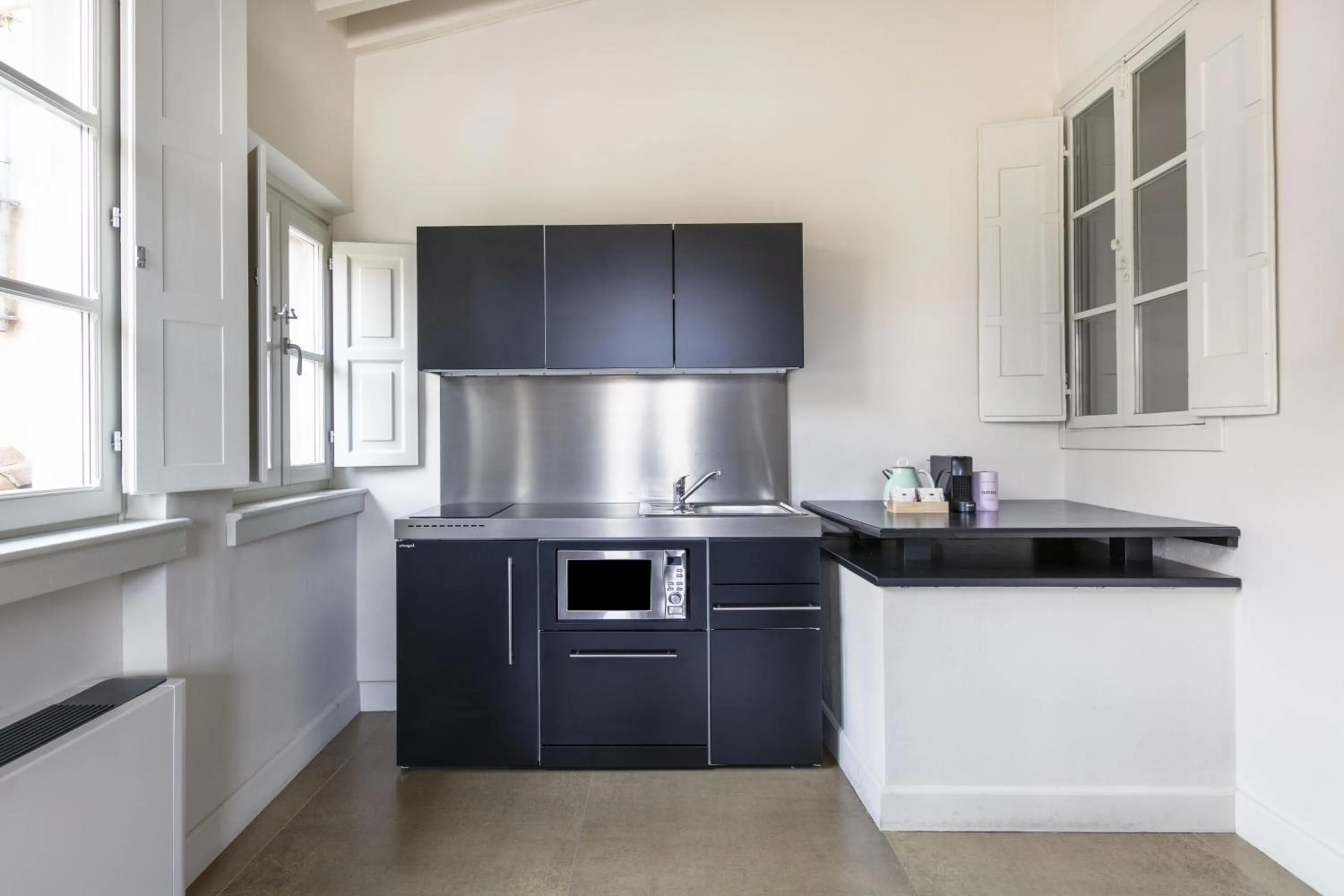 Kitchen or kitchenette in Numa Florence Felice