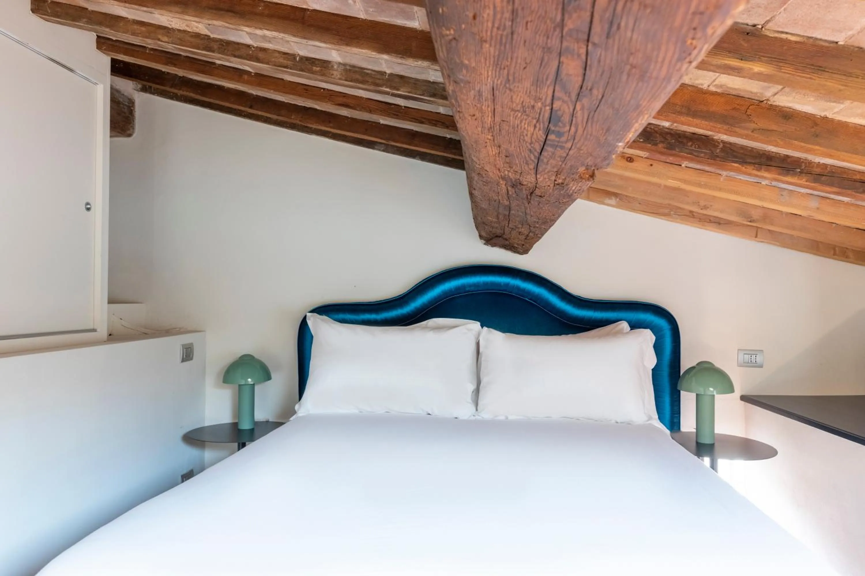 Bed in Numa Florence Felice