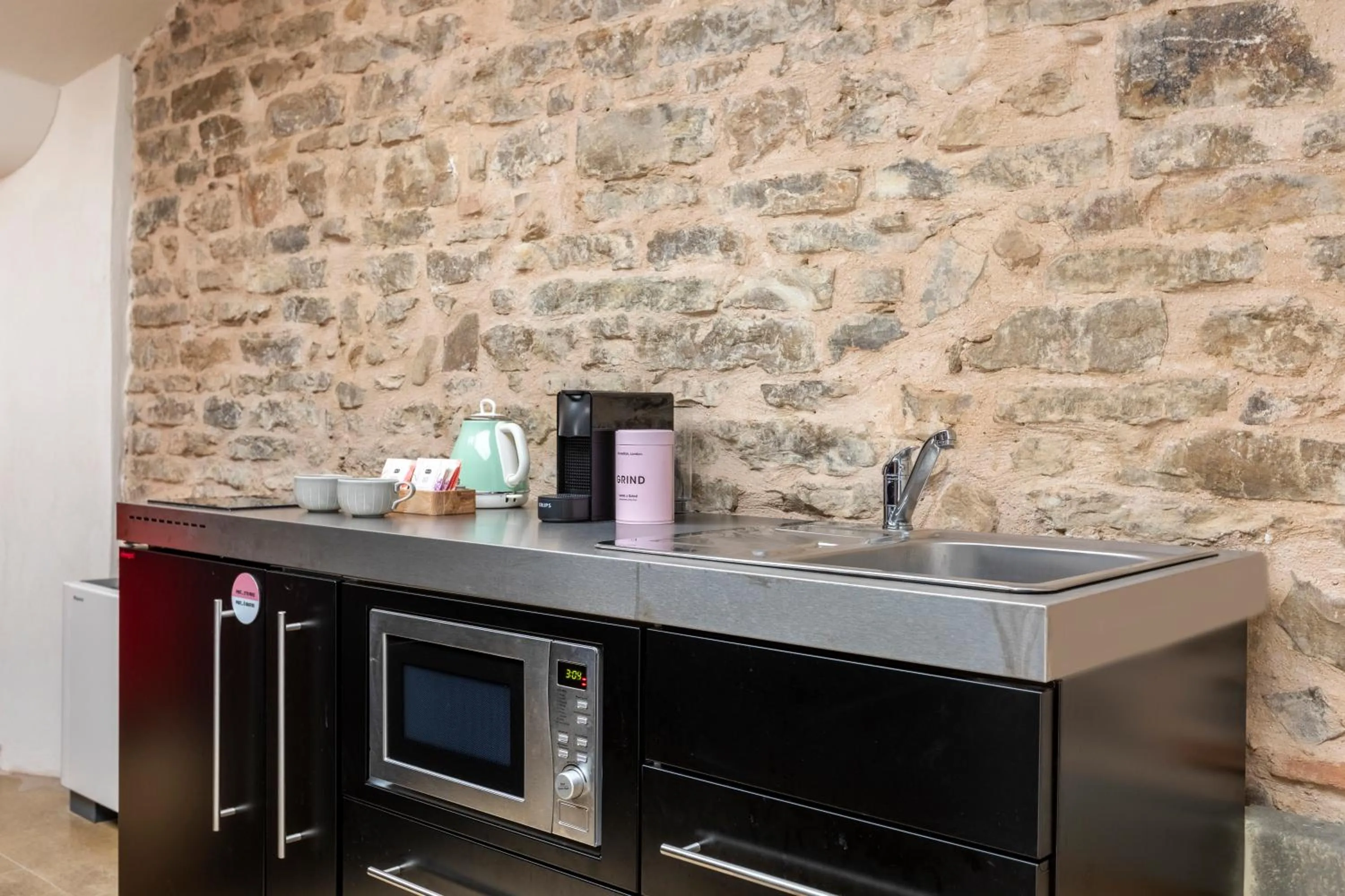 Kitchen or kitchenette in Numa Florence Felice