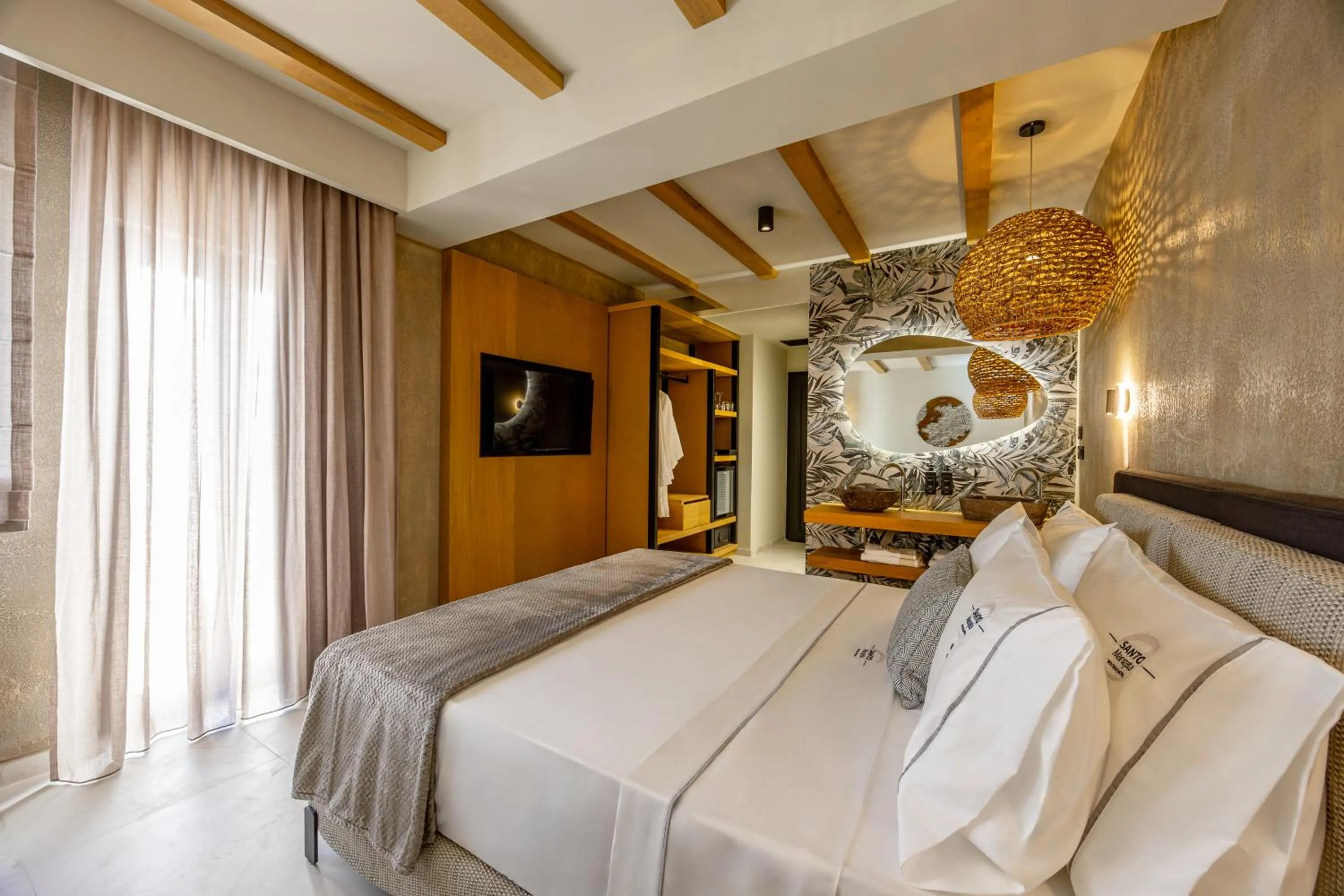 Bed in Santo Mangata Boutique Hotel and Spa