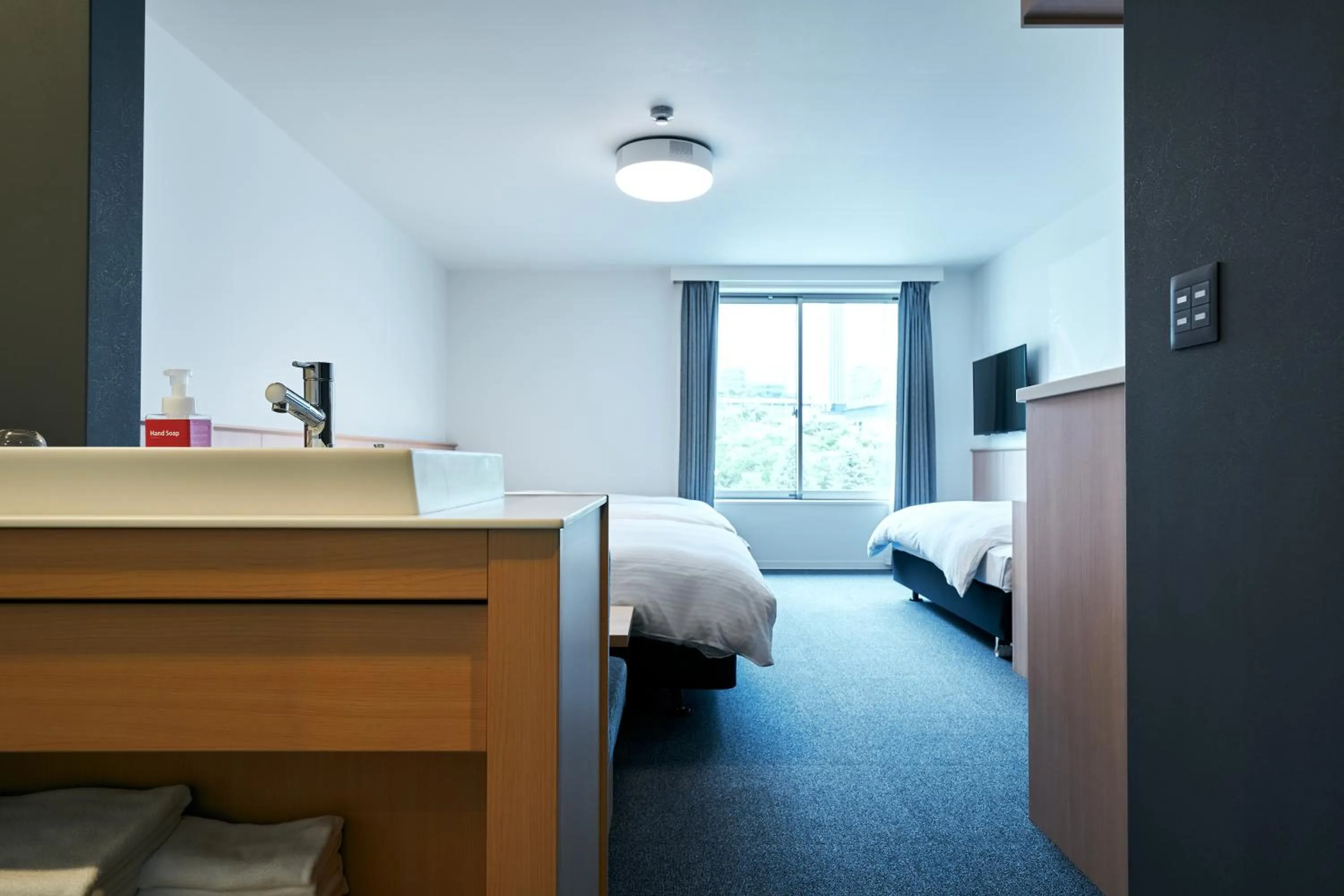 Bed in Rakuten STAY Osaka Station North