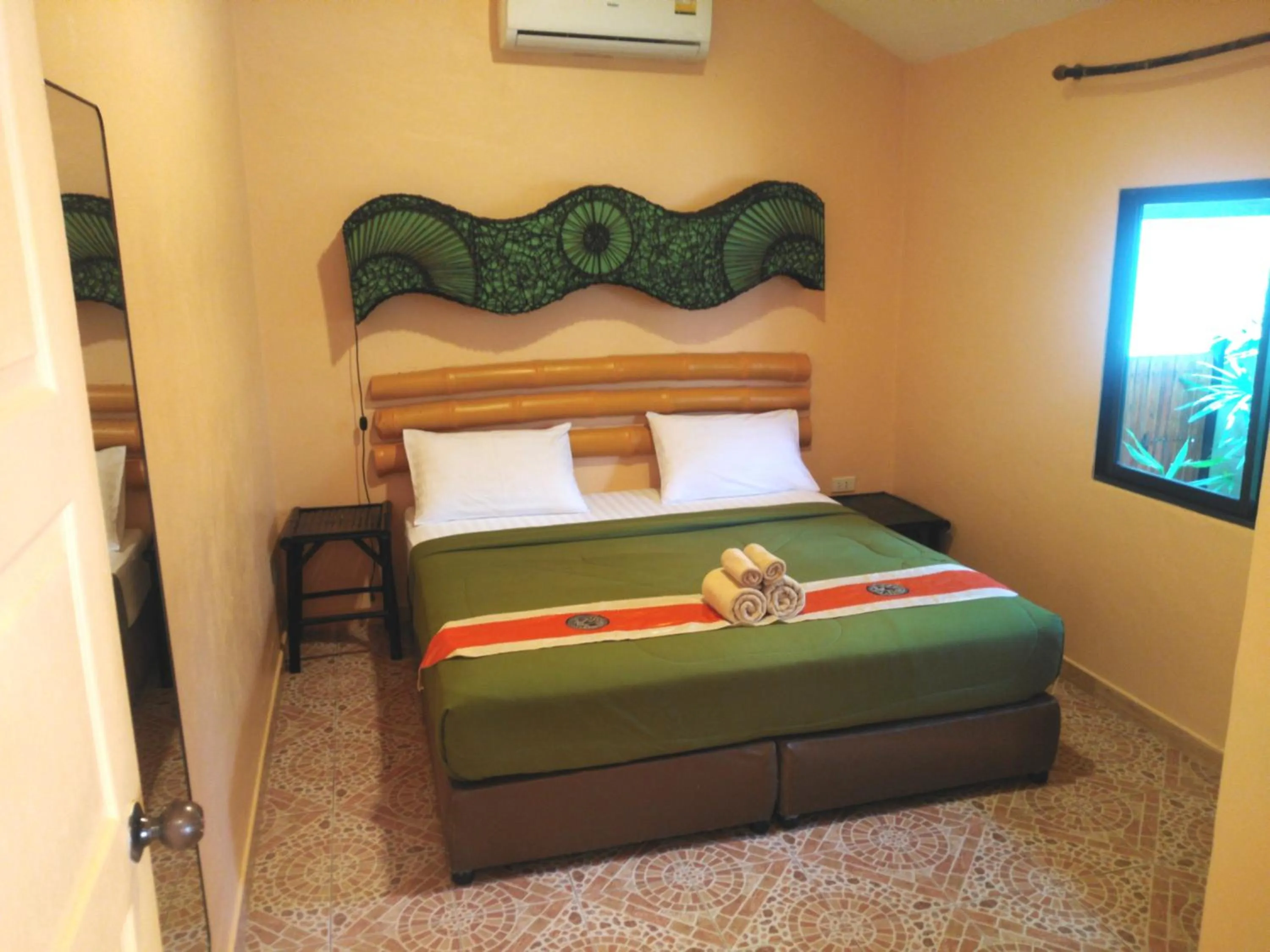 Bedroom in Kamala Tropical Garden Hotel