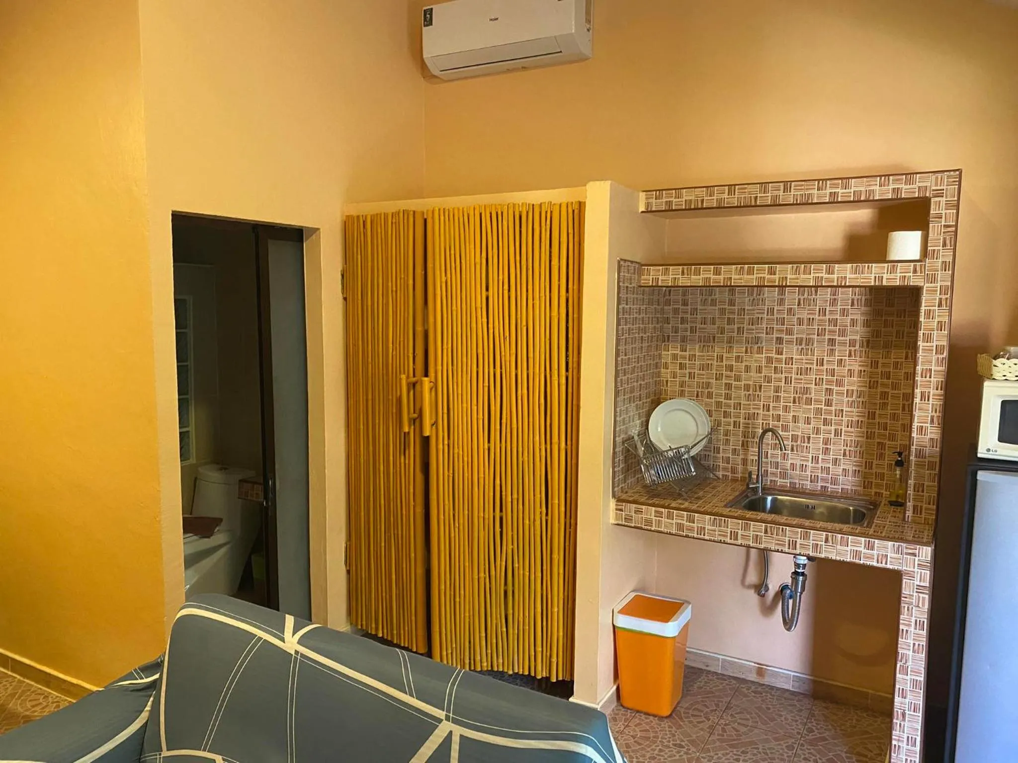 Kitchen or kitchenette, Bathroom in Kamala Tropical Garden Hotel