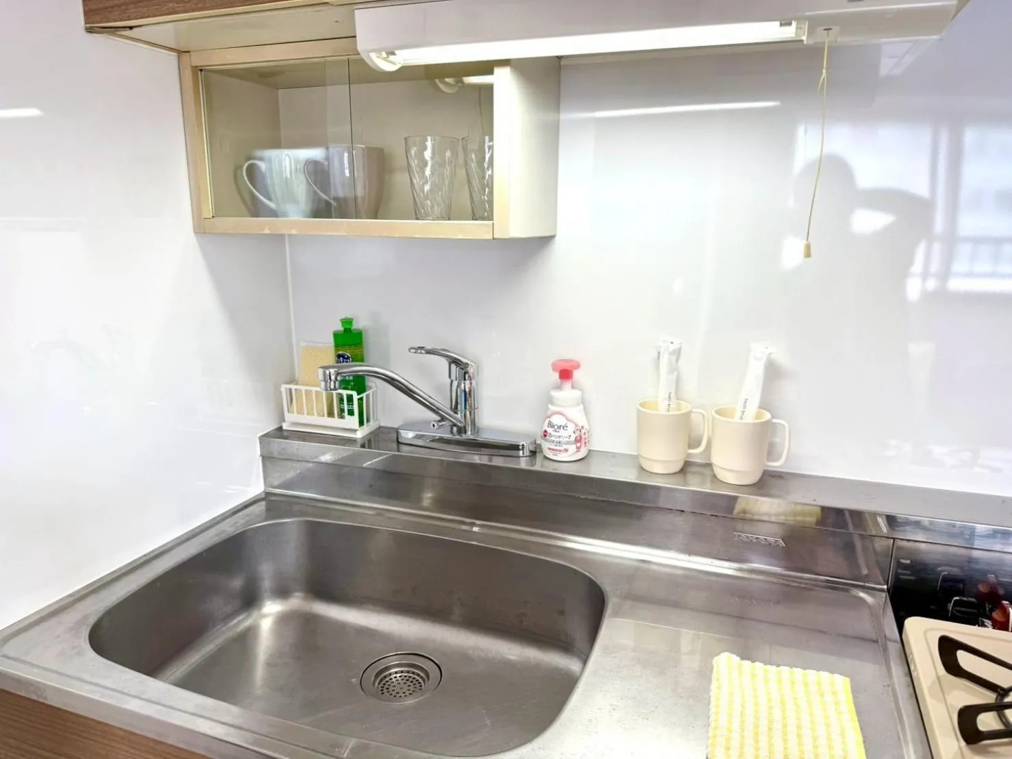 Kitchen or kitchenette in KIYAZA Space Sapporo 2