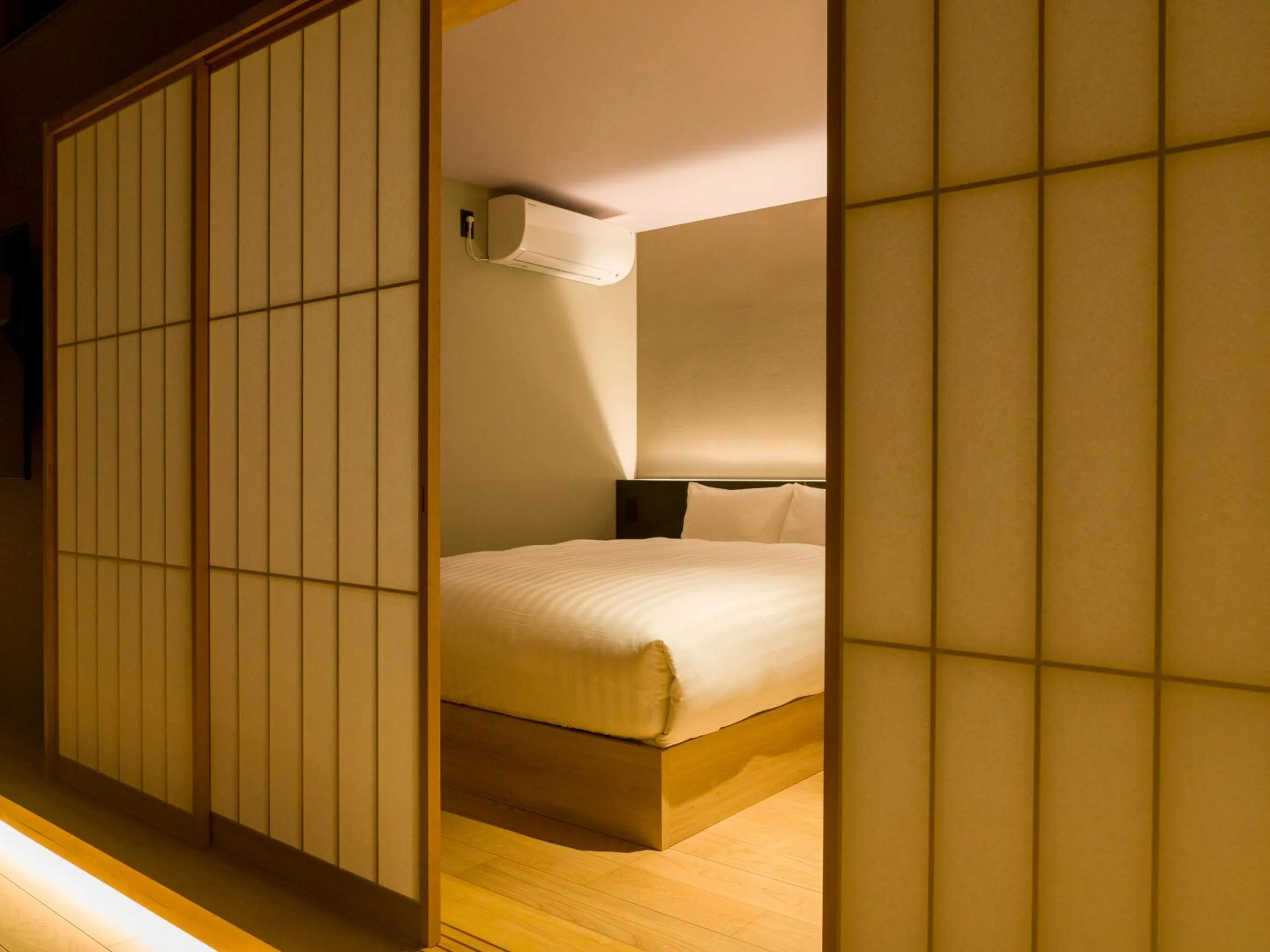 Bed in Rakuten STAY VILLA Kamogawa