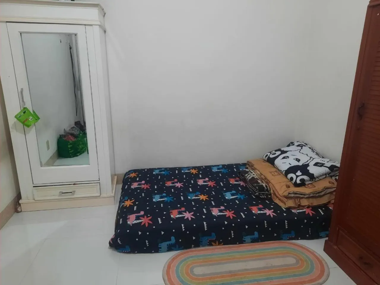Bedroom, Bed in OYO Life 93160 Kost Jenny Karawang