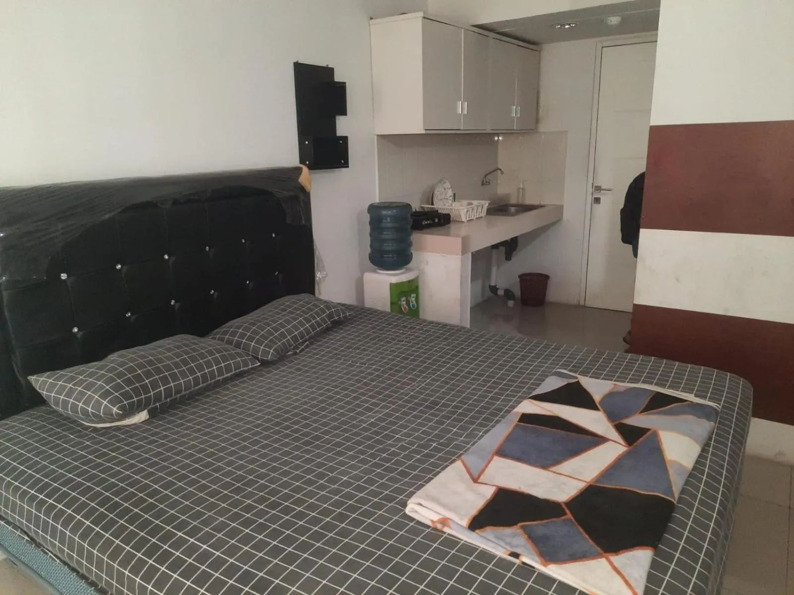 Bedroom, Bed in OYO Life 93139 Apartemen Grand Sentraland By Evi