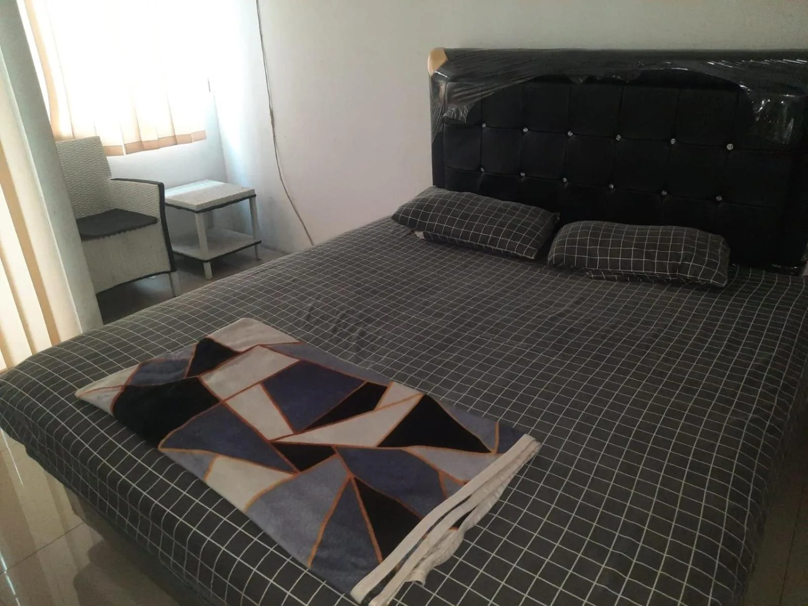 Bedroom, Bed in OYO Life 93139 Apartemen Grand Sentraland By Evi