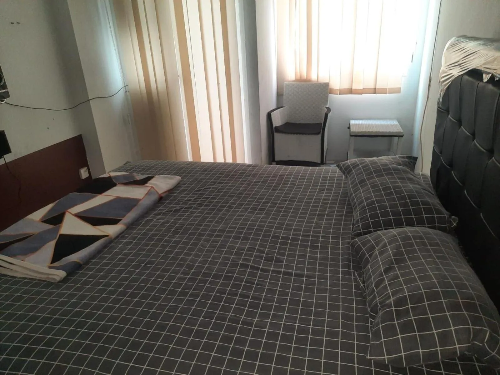Bedroom, Bed in OYO Life 93139 Apartemen Grand Sentraland By Evi