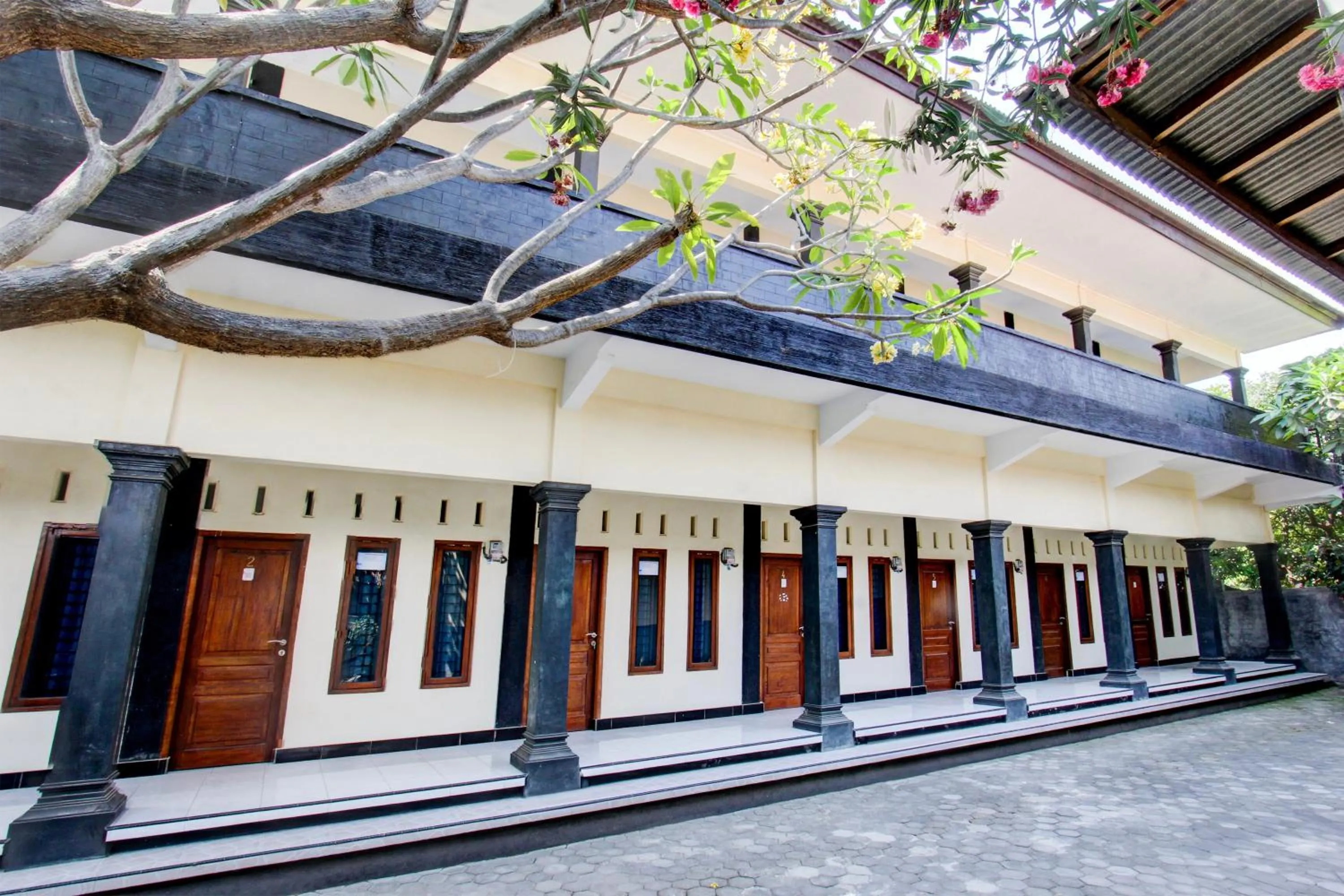 Facade/entrance in OYO Life 93155 Wisma Sarah