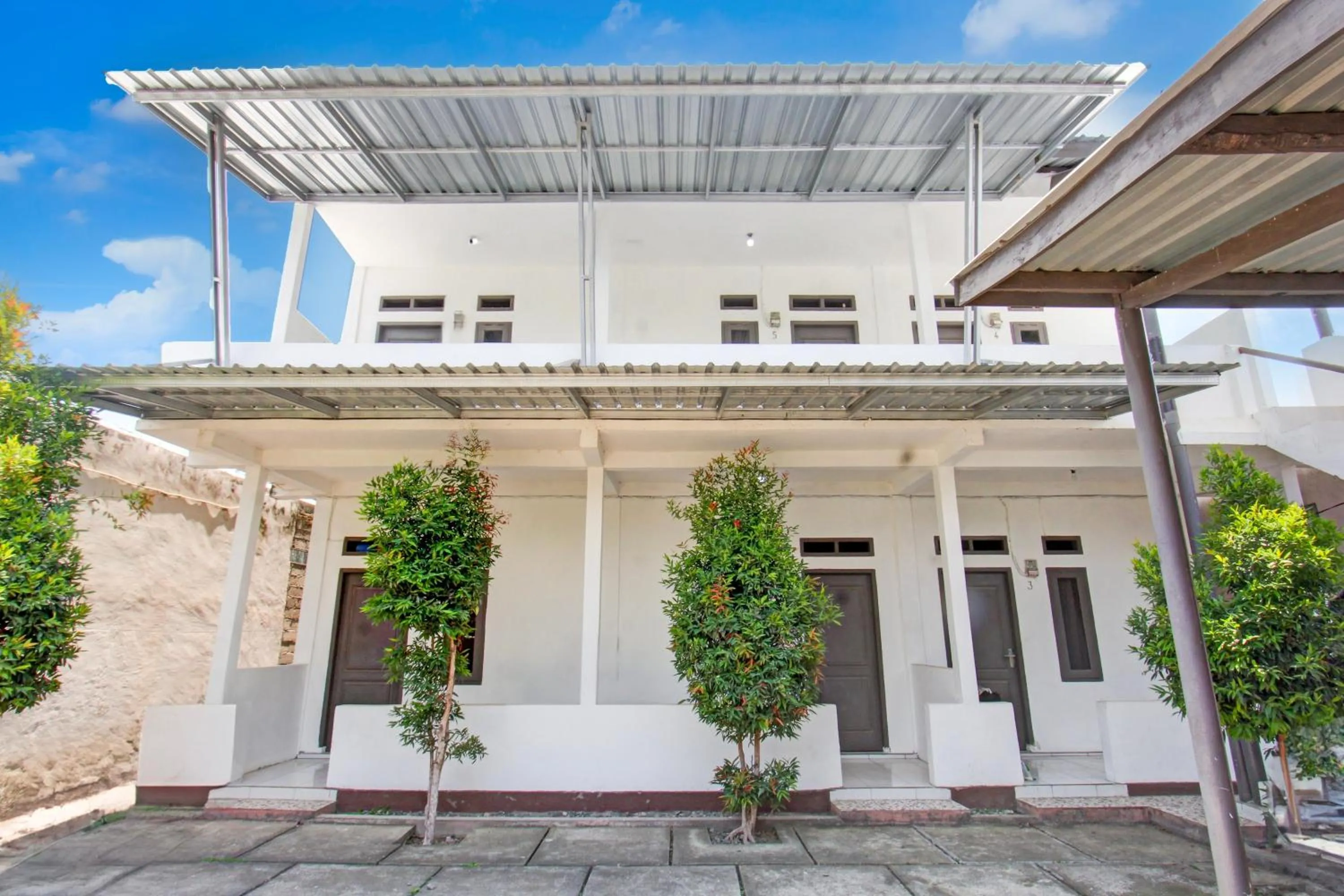 Facade/entrance in OYO Life 93154 White Kos Jenggala