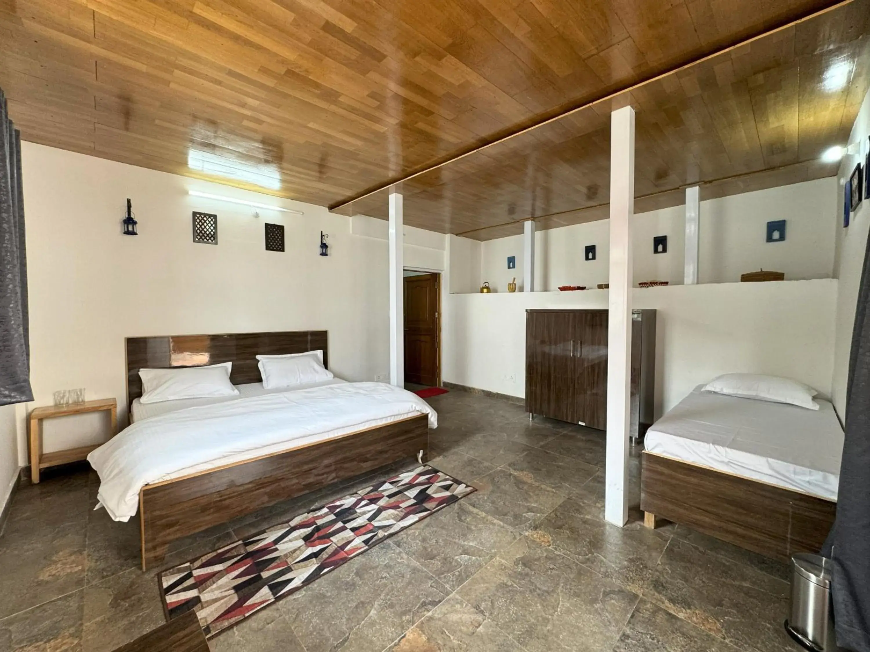 Bed in Wanderlust Mukteshwar Bed in Wanderlust Mukteshwar