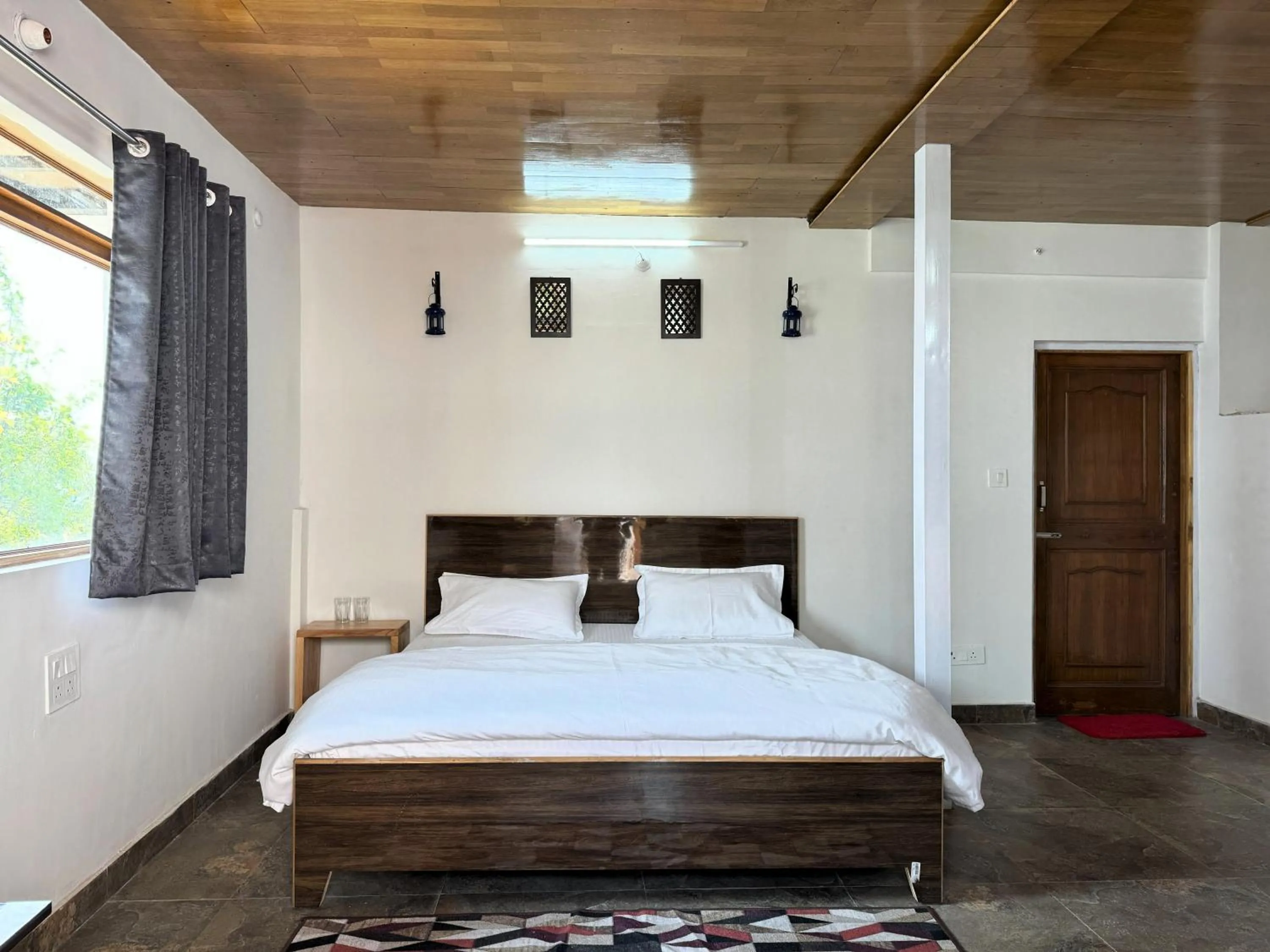 Bed in Wanderlust Mukteshwar