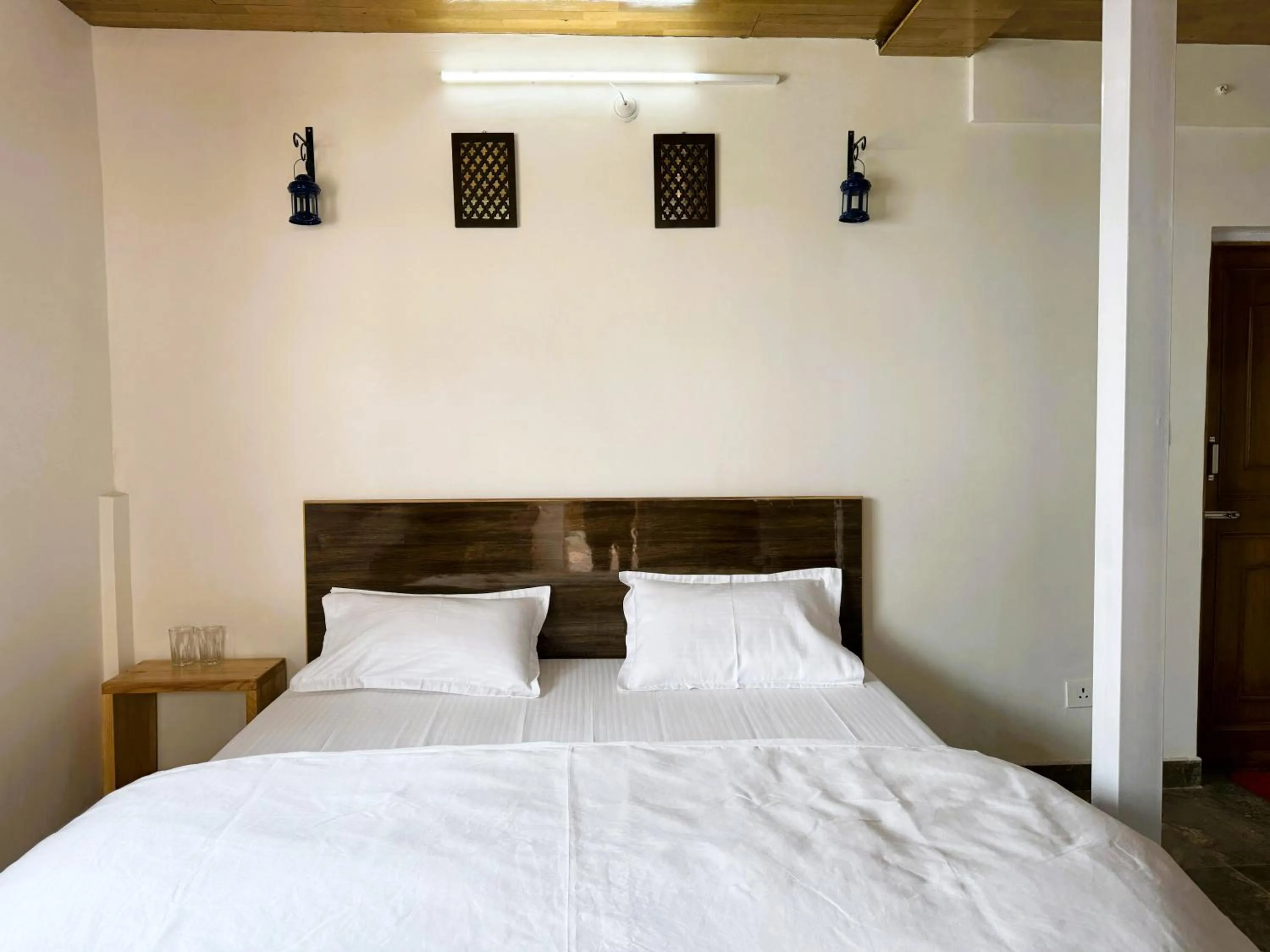 Bed in Wanderlust Mukteshwar