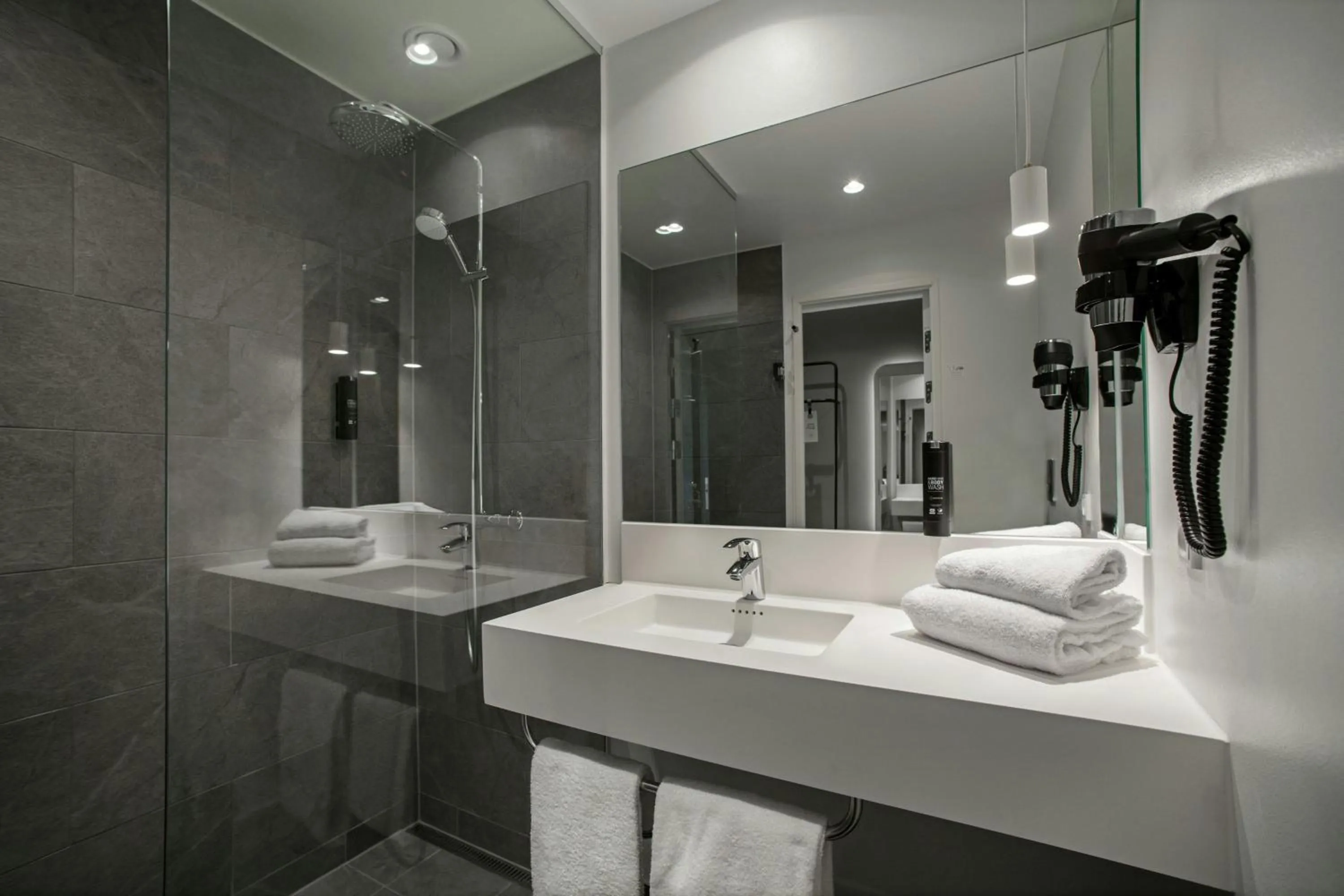 Bathroom in Four Points Flex by Sheraton Horsens